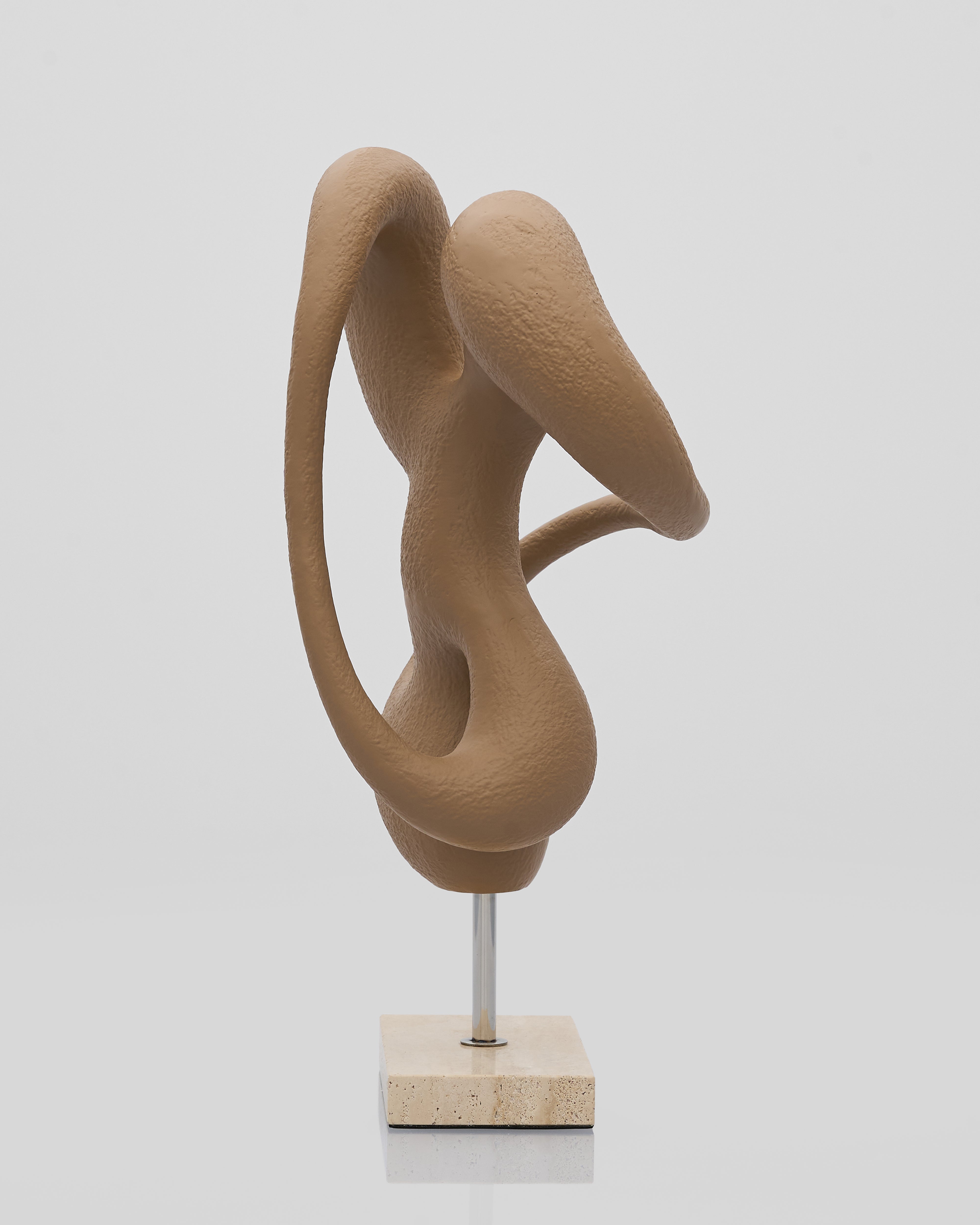 Beige abstract sculpture with minimum thickness on a white background