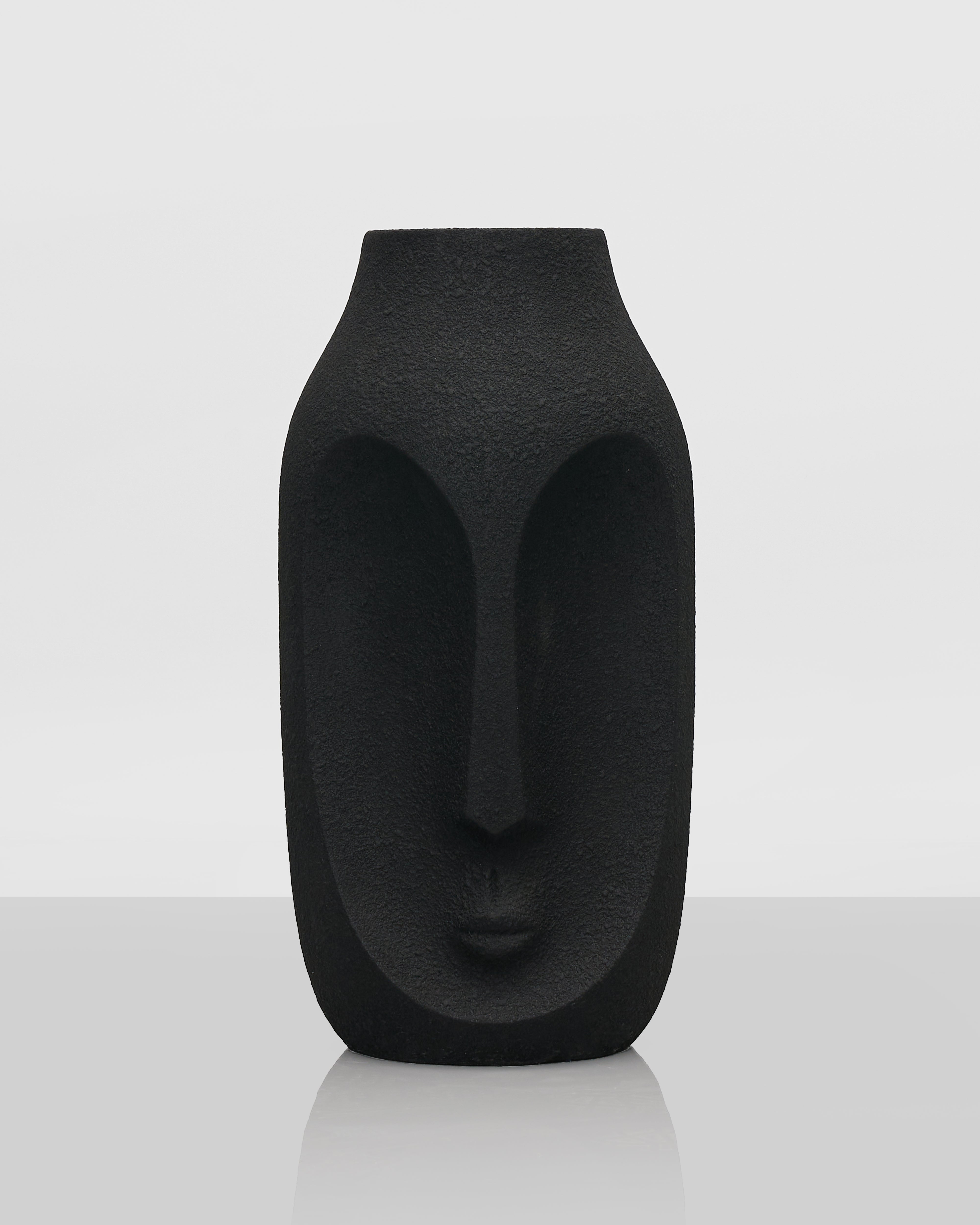 Black abstract vase on a white background
