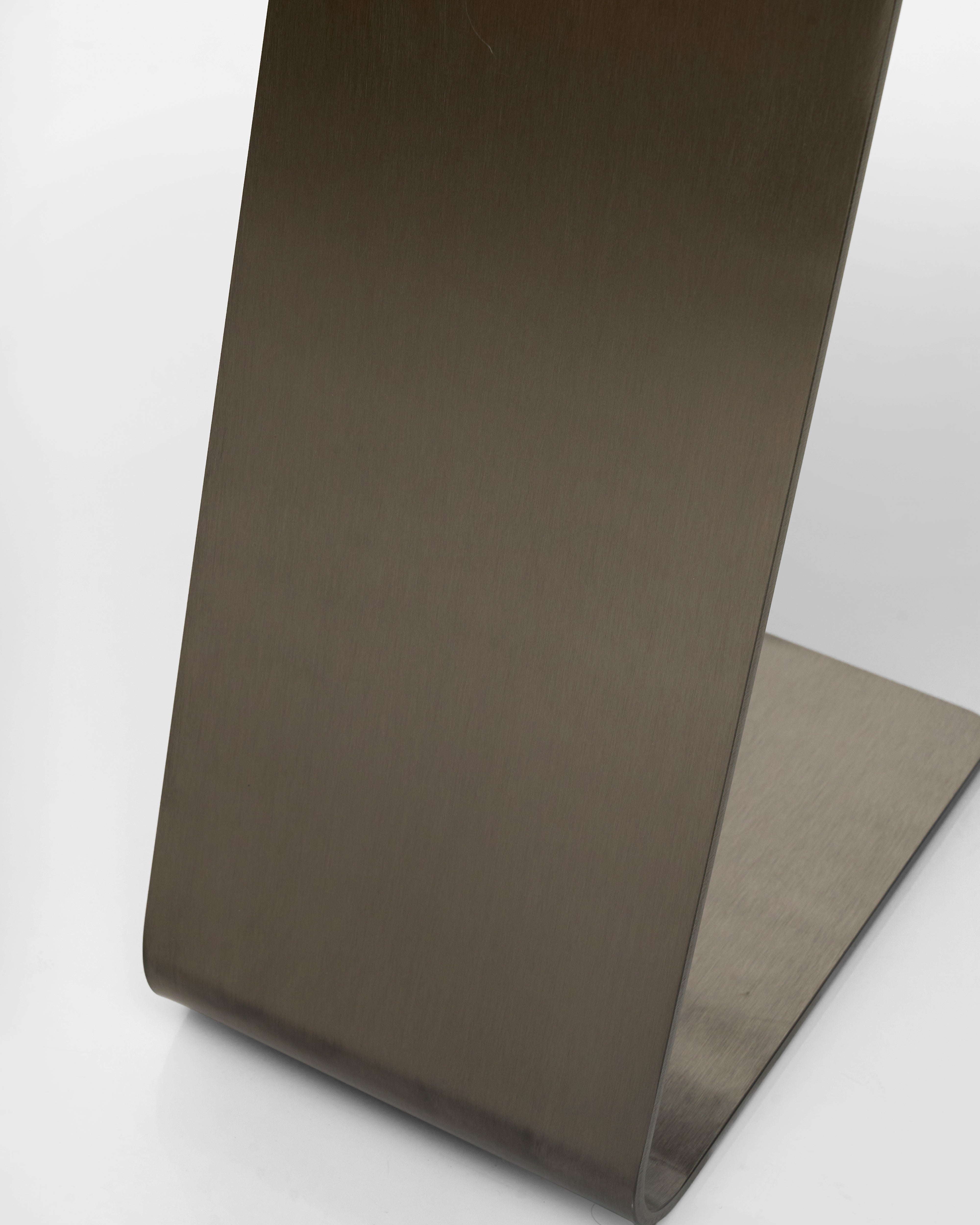 silver matte leg surface of the side table on a white background