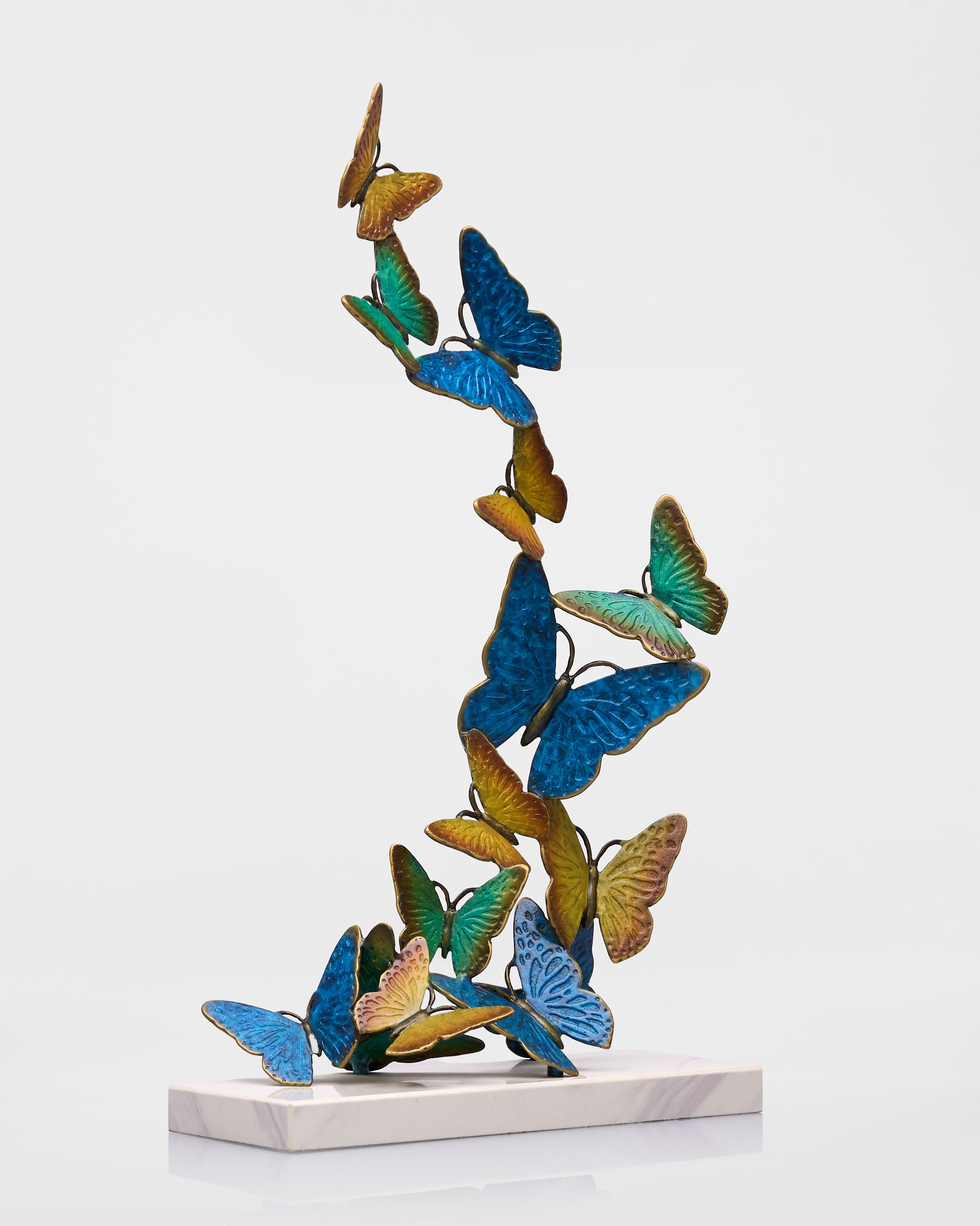 Decorative sculpture of butterflies on a white background