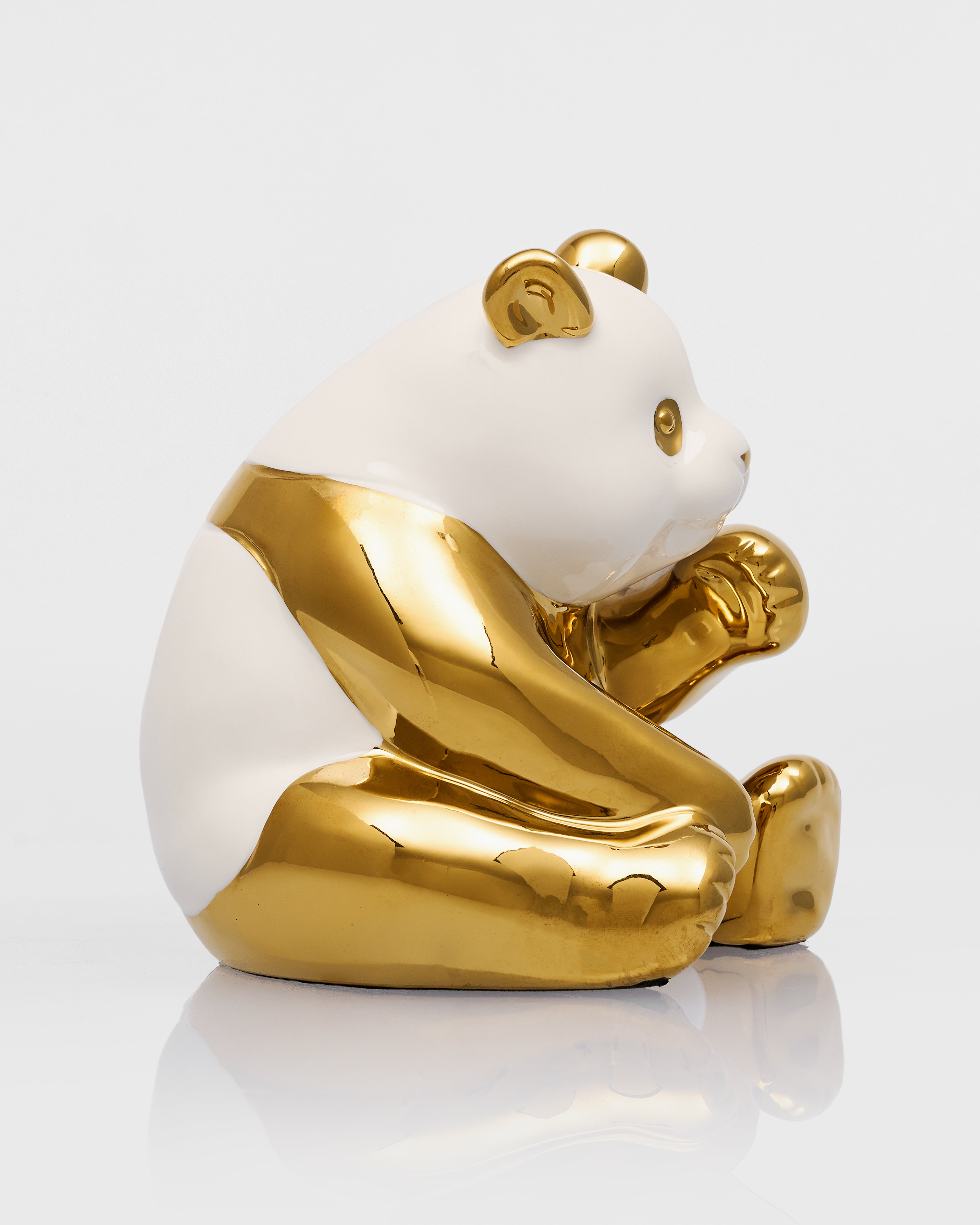 Zenora Ceramic Sitting Golden Panda Figurine