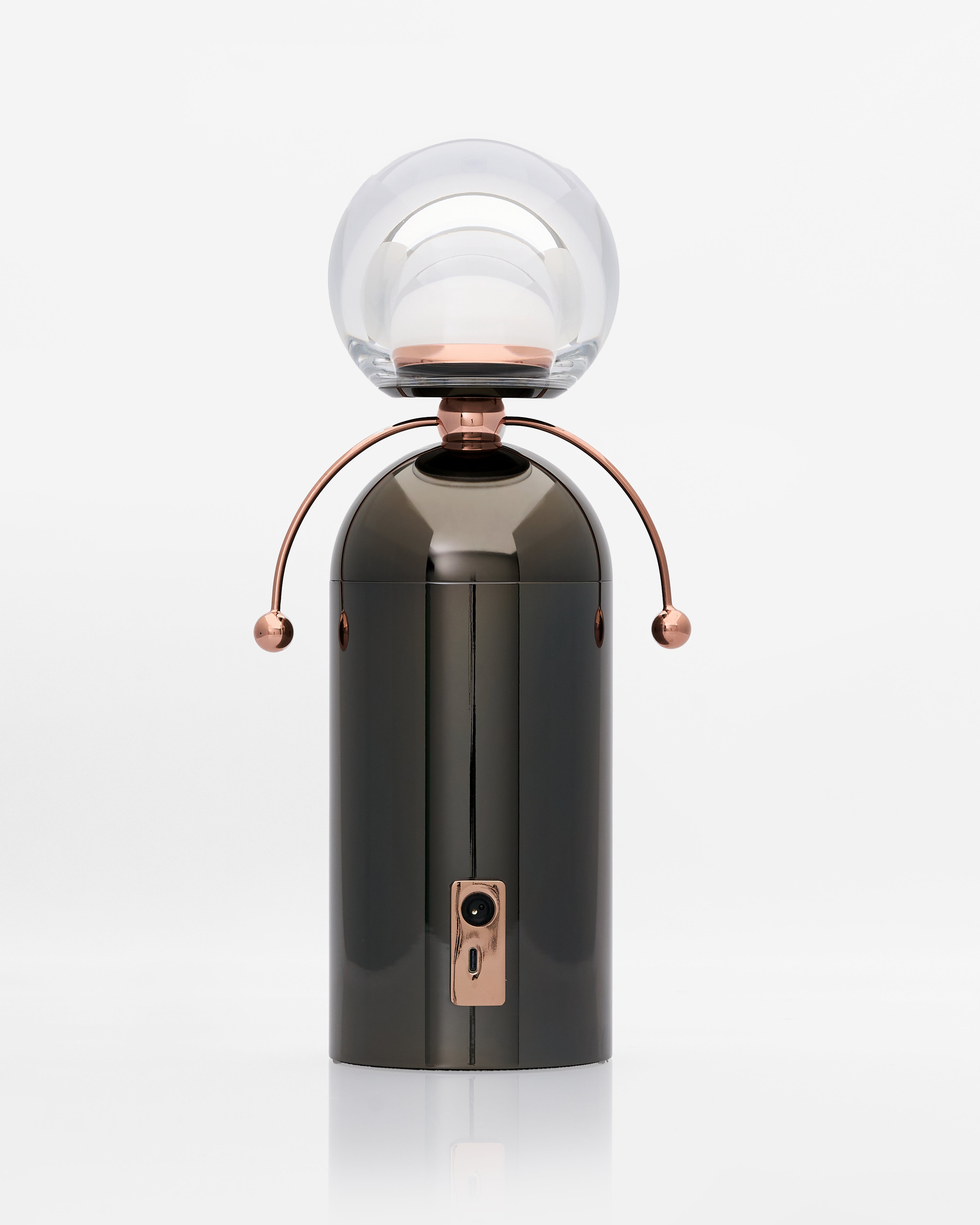 Modern lamp with a glass shade on a white background