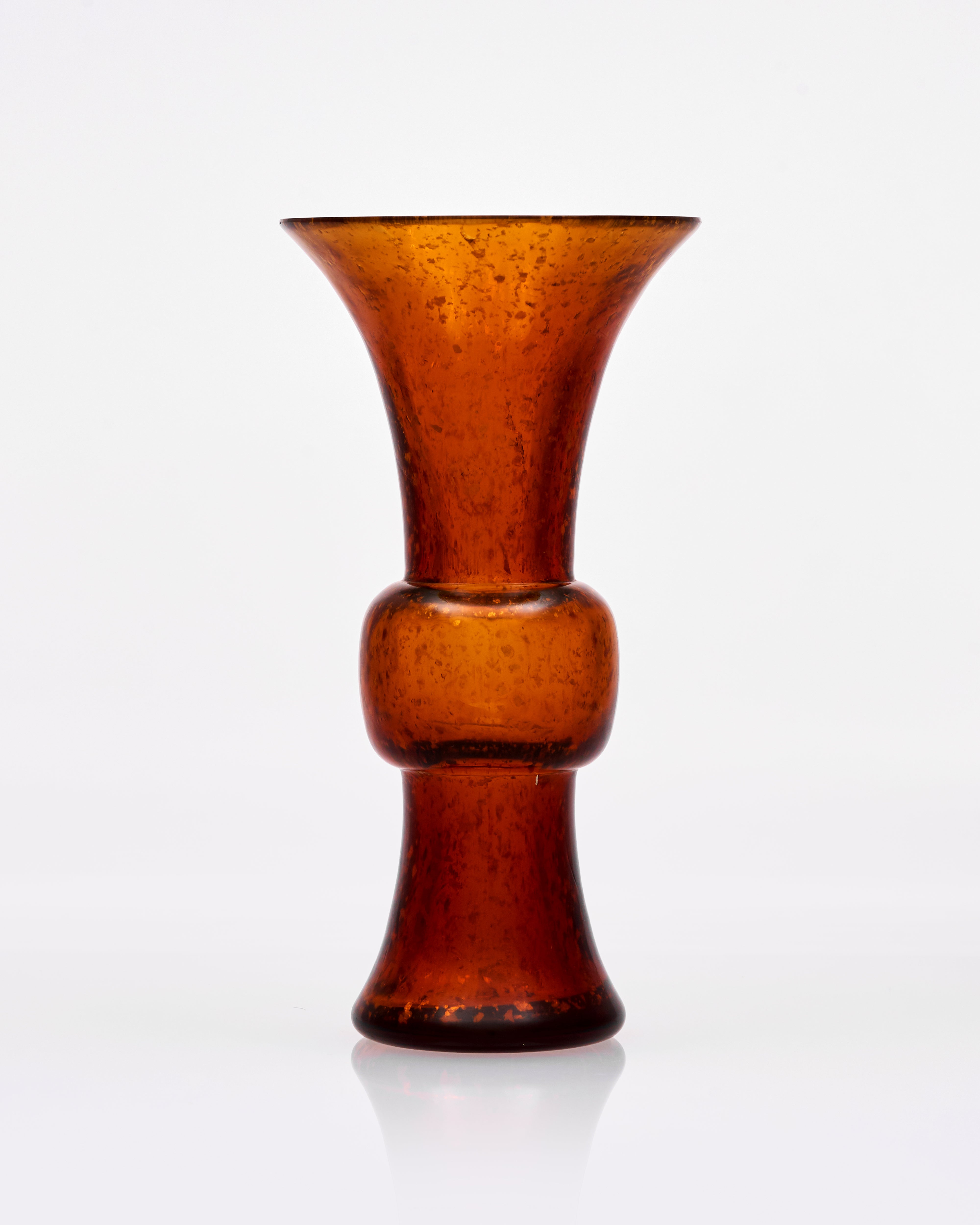 Brown glass vase on a white background