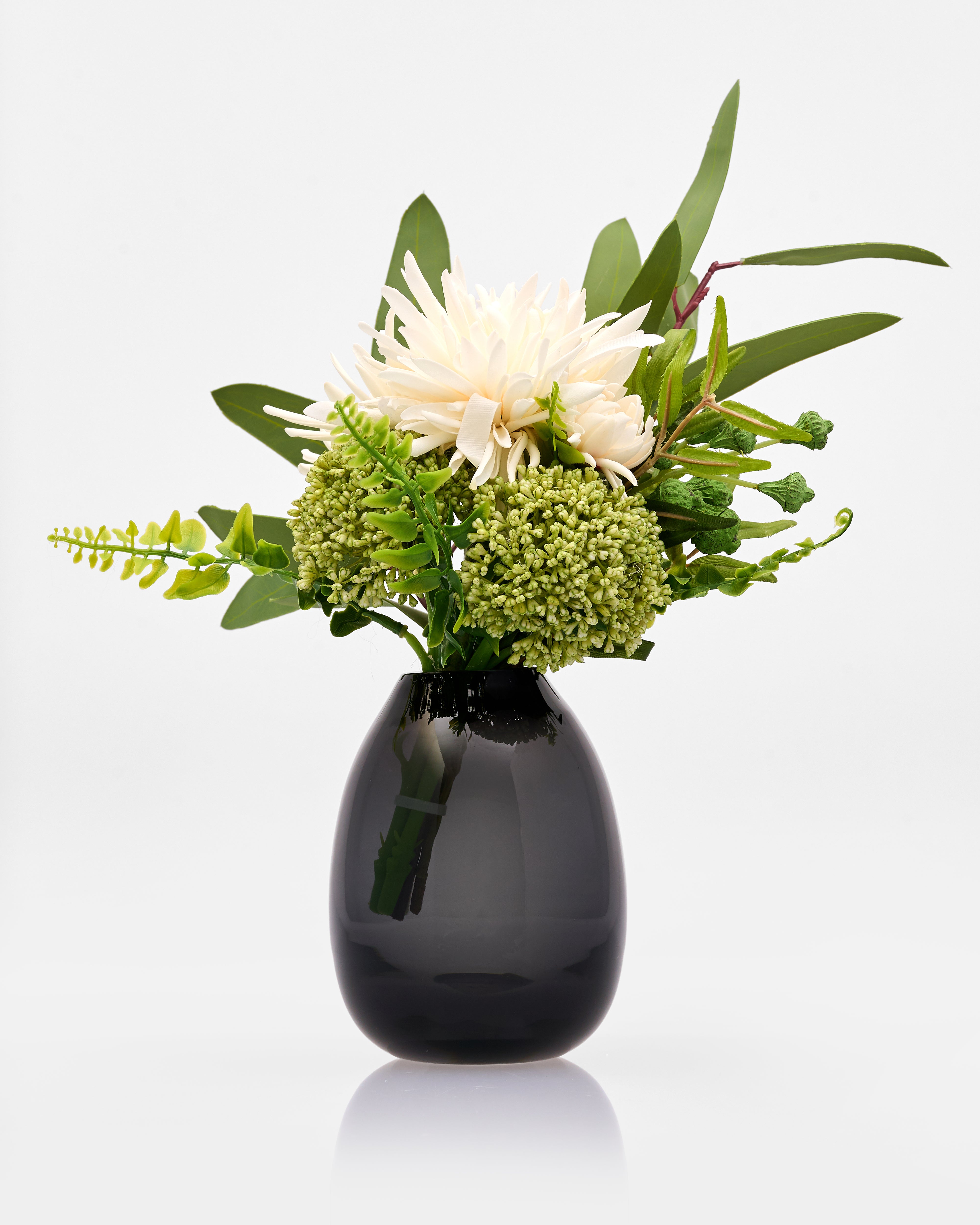 Black vase with a bouquet of flowers on a white background