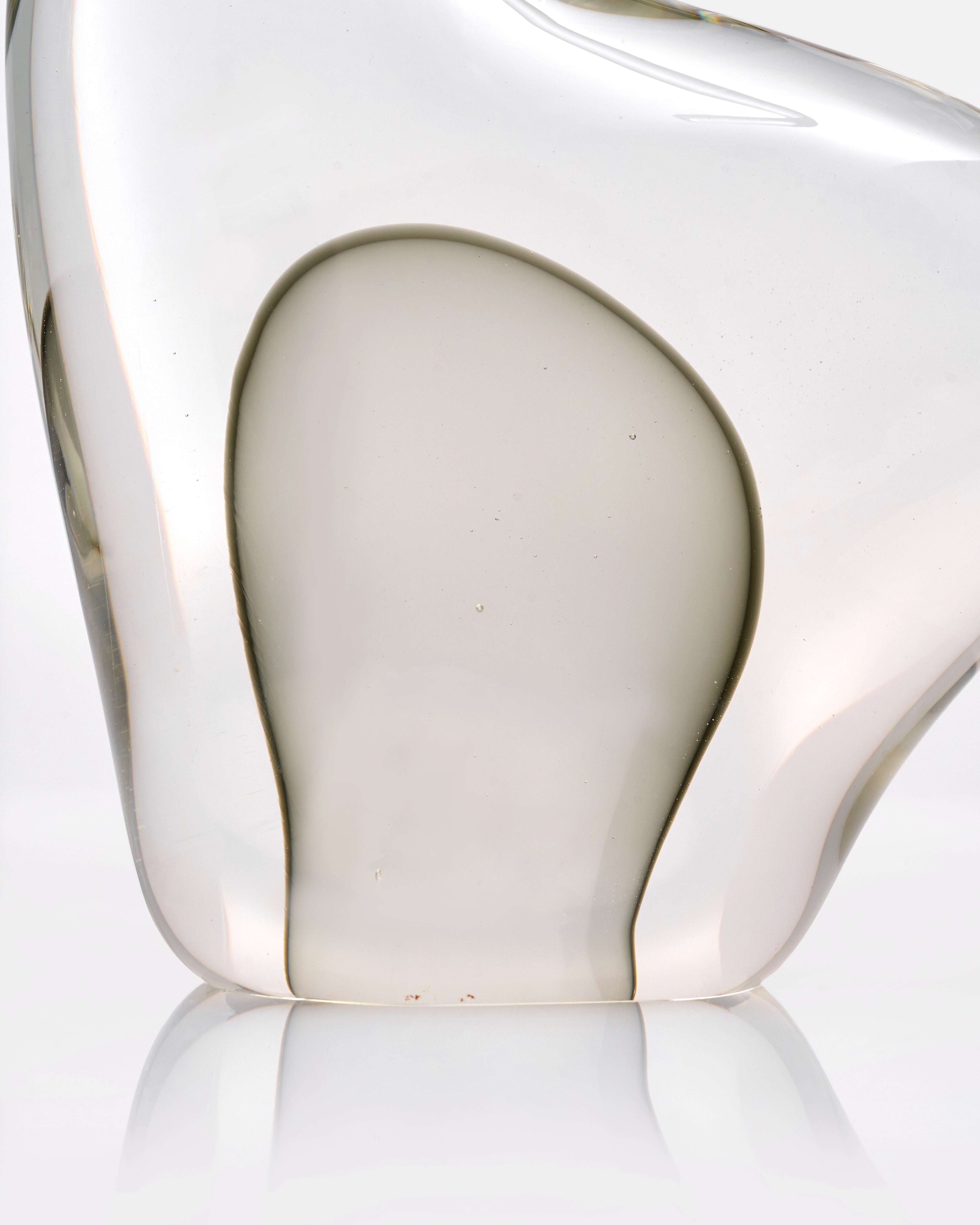 Clear glass vase with a unique design on a white background