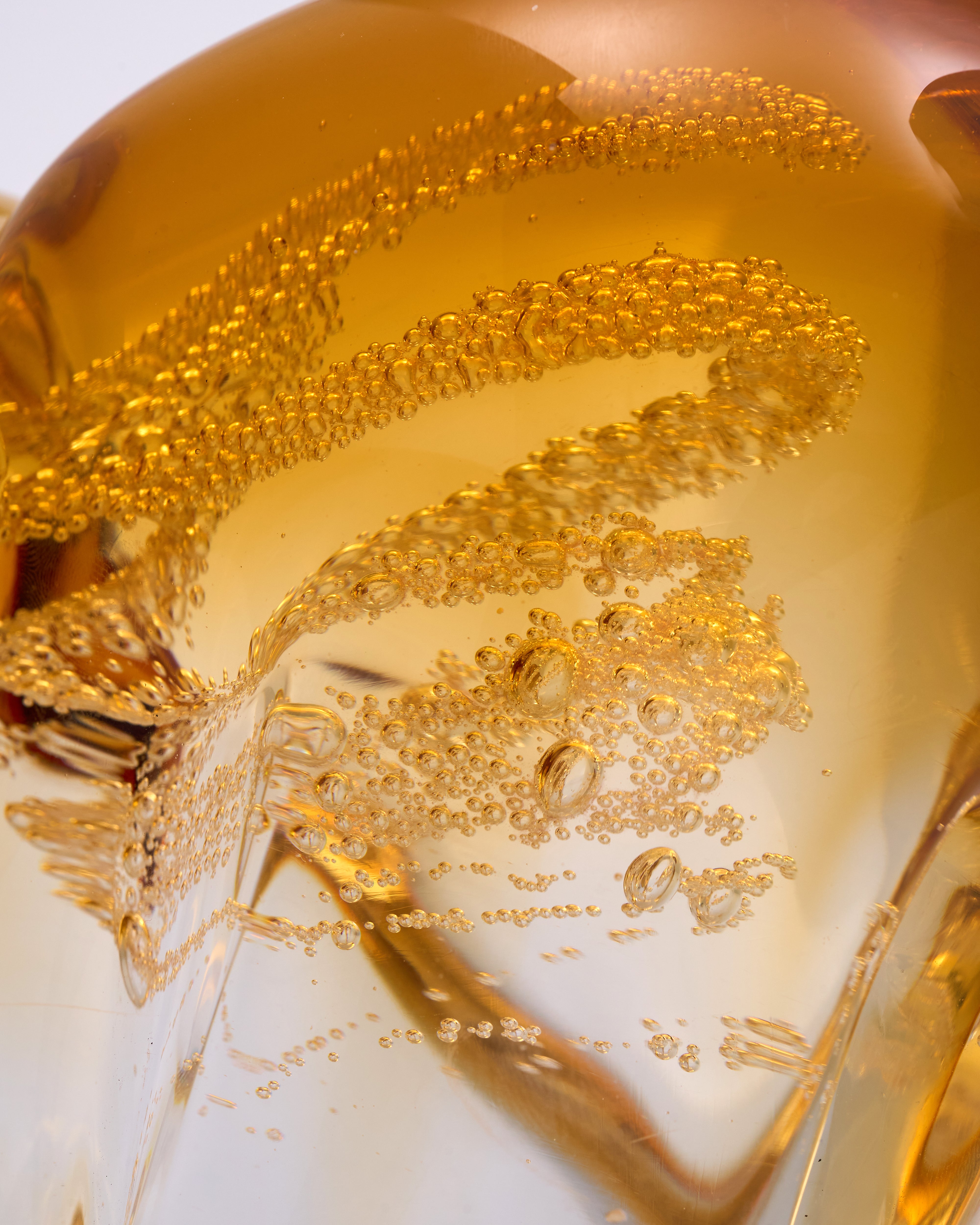 Close-up of a gold decorative Elephant Crystal Decor Set with intricate patterns on a light background