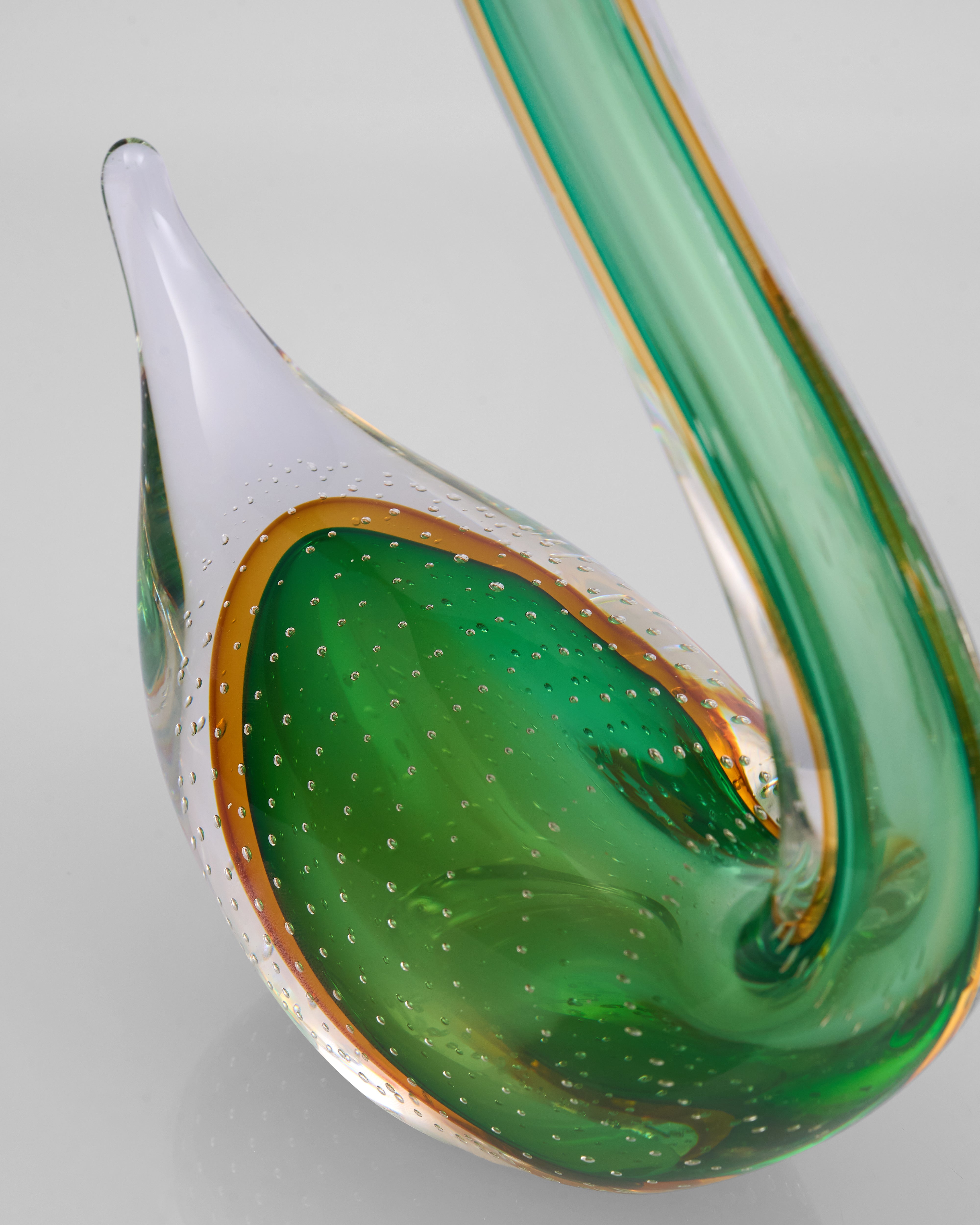 Green Swan Crystal Glass Decor object with green and white colors on a gray background