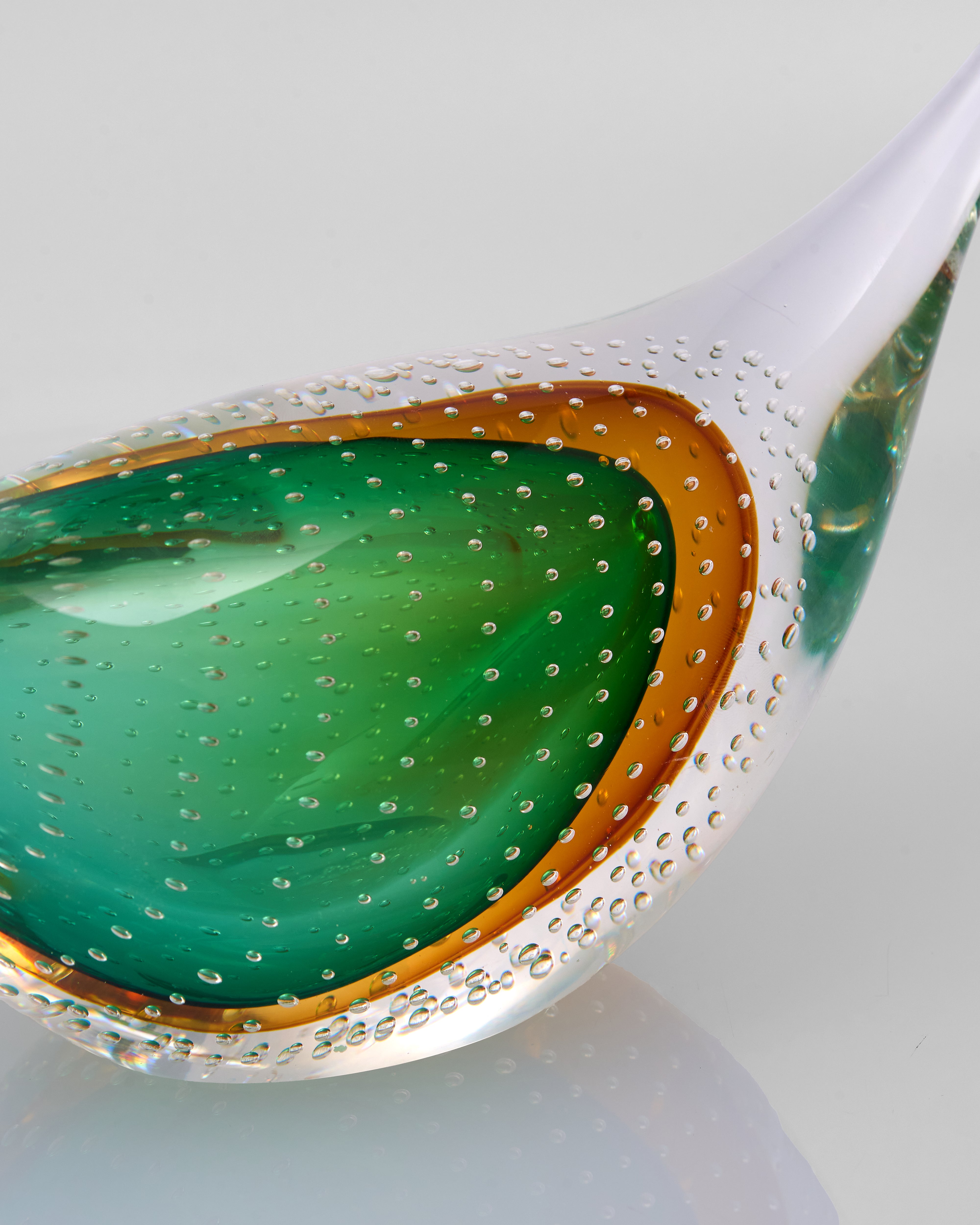 Green Swan Crystal Glass Decor object with green interior and white exterior on a light gray background