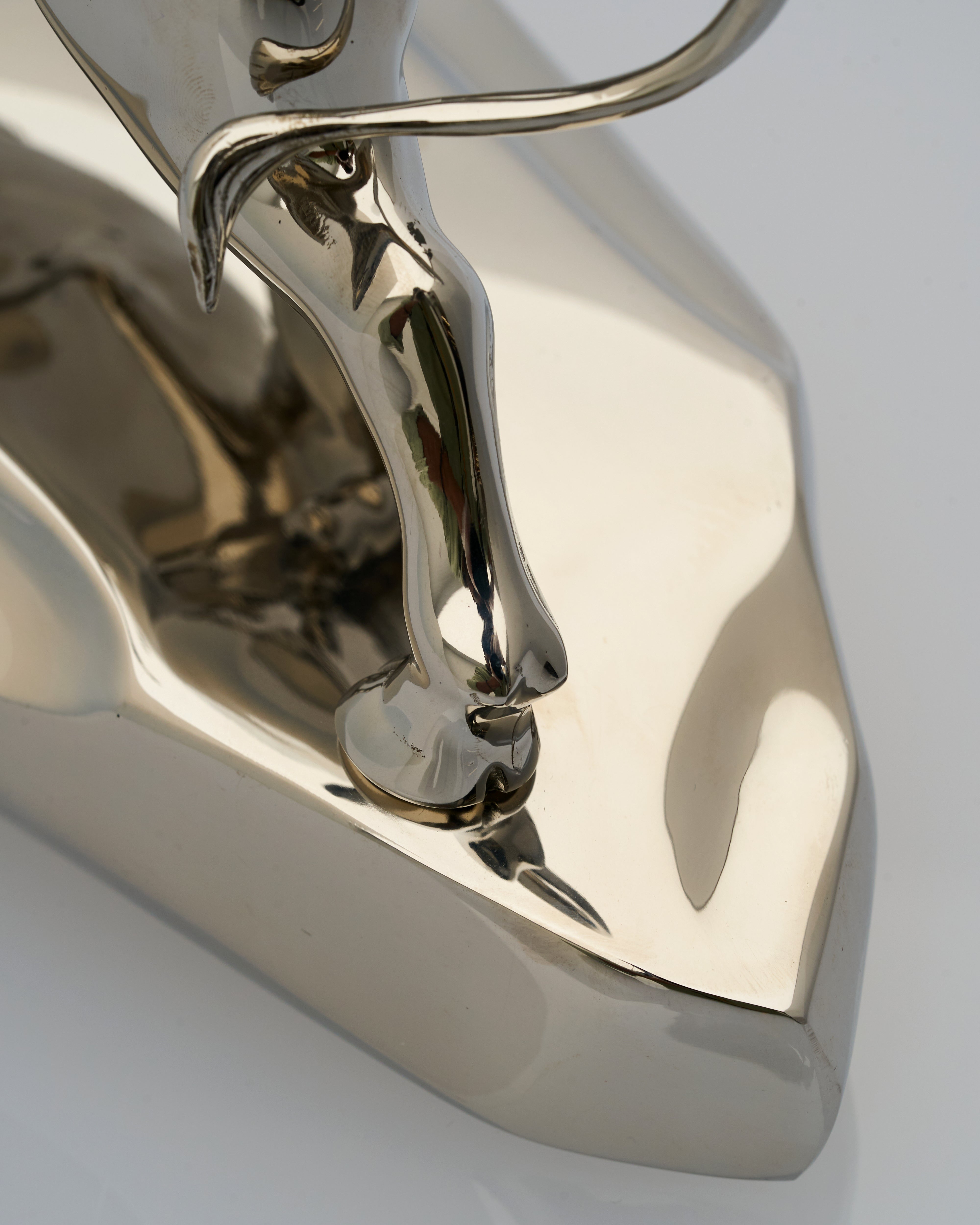 Close-up of a shiny metallic object with reflective surface