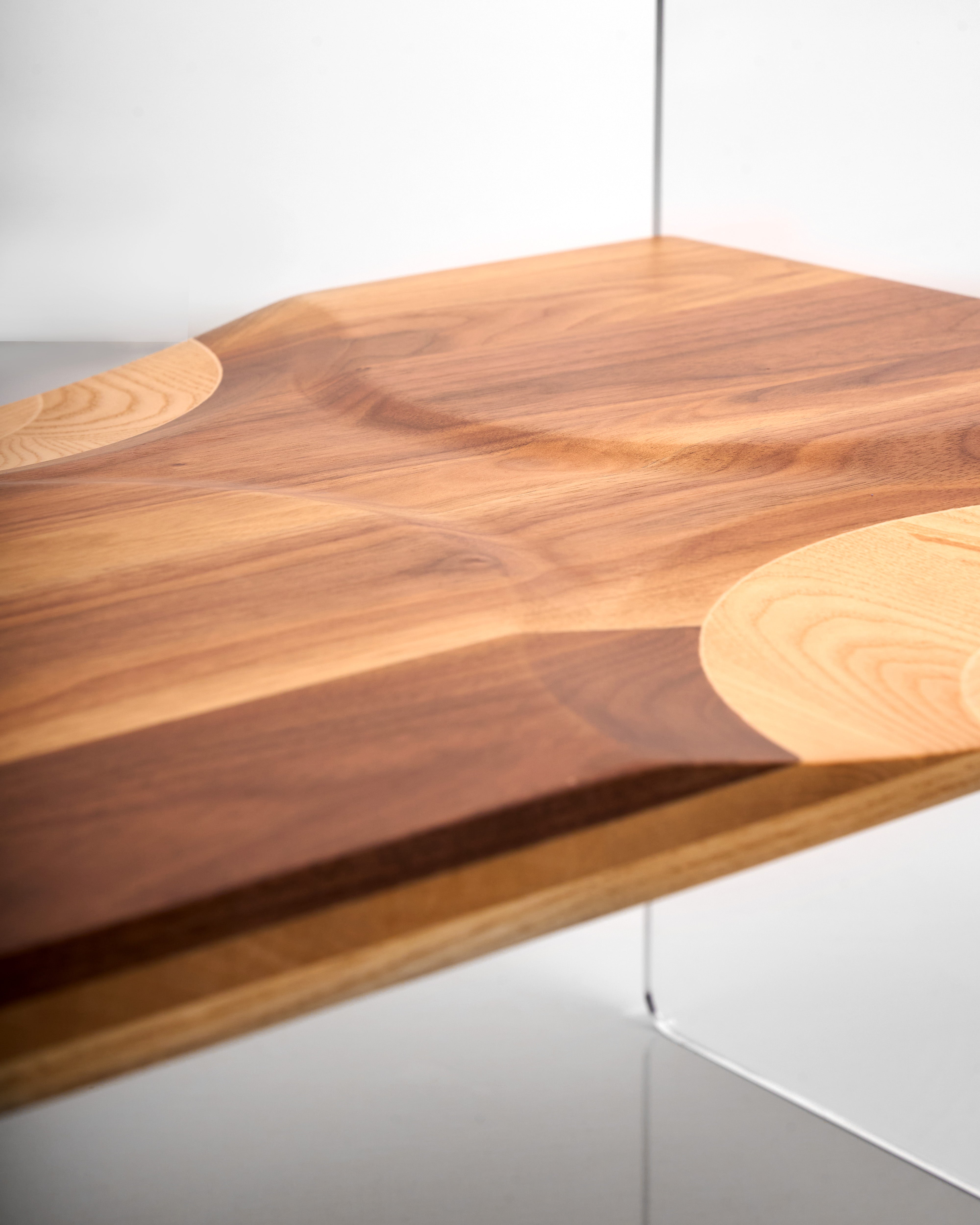 Wooden coffee table with a modern design on a white background