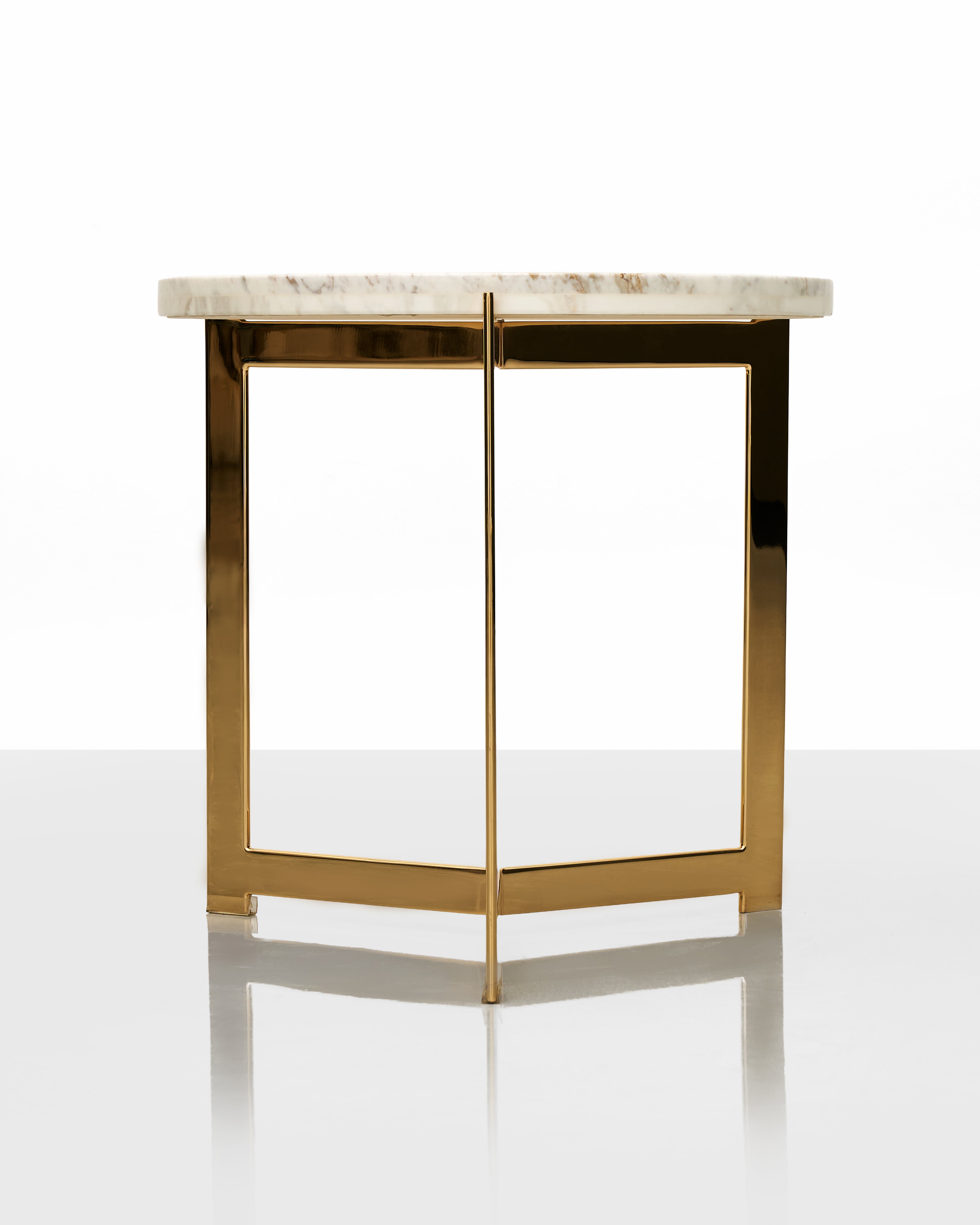 Bar height table with marble top and gold metal frame on a white background