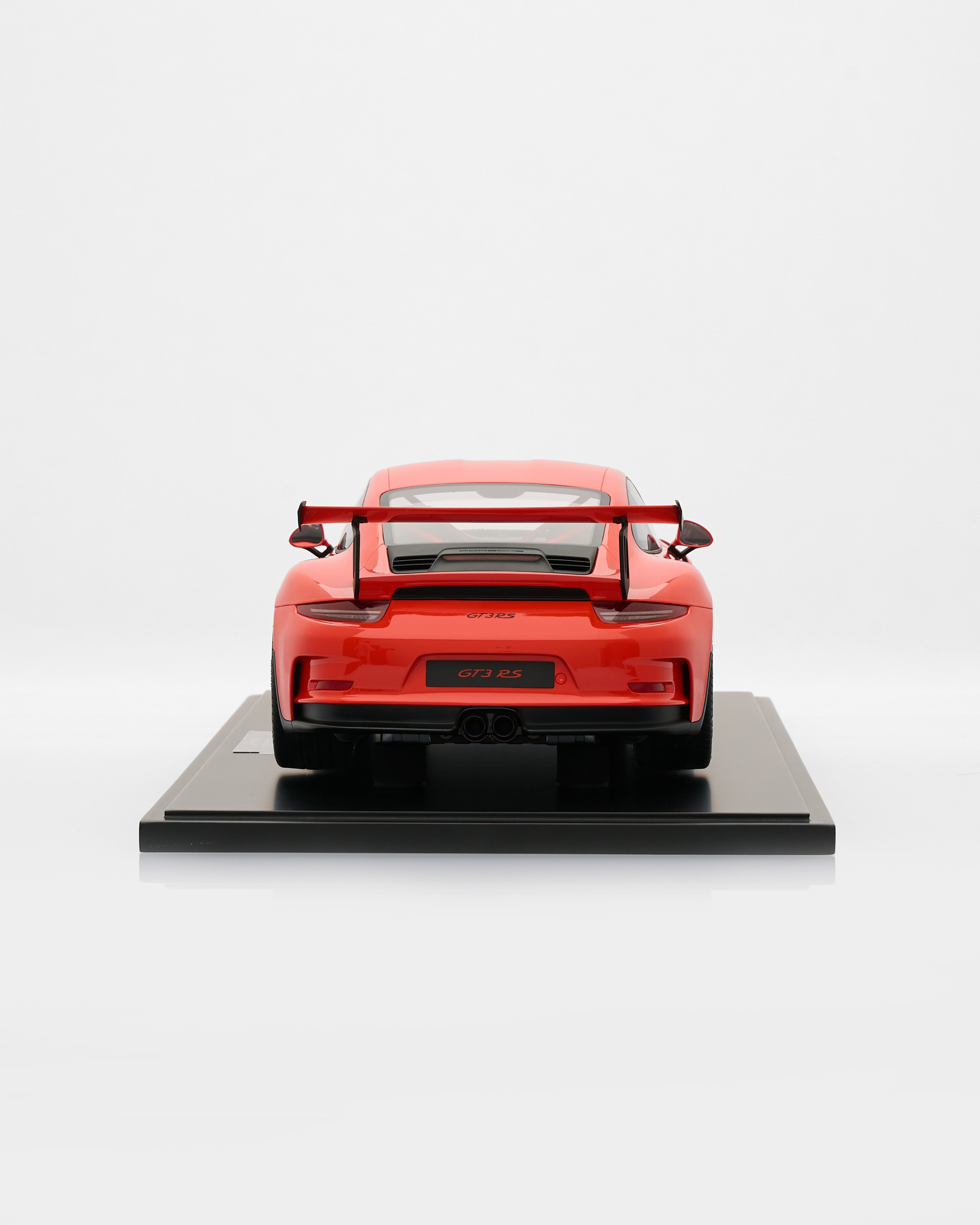 Red Porsche 911 GT3RS Lava Orange sports car model on a white background