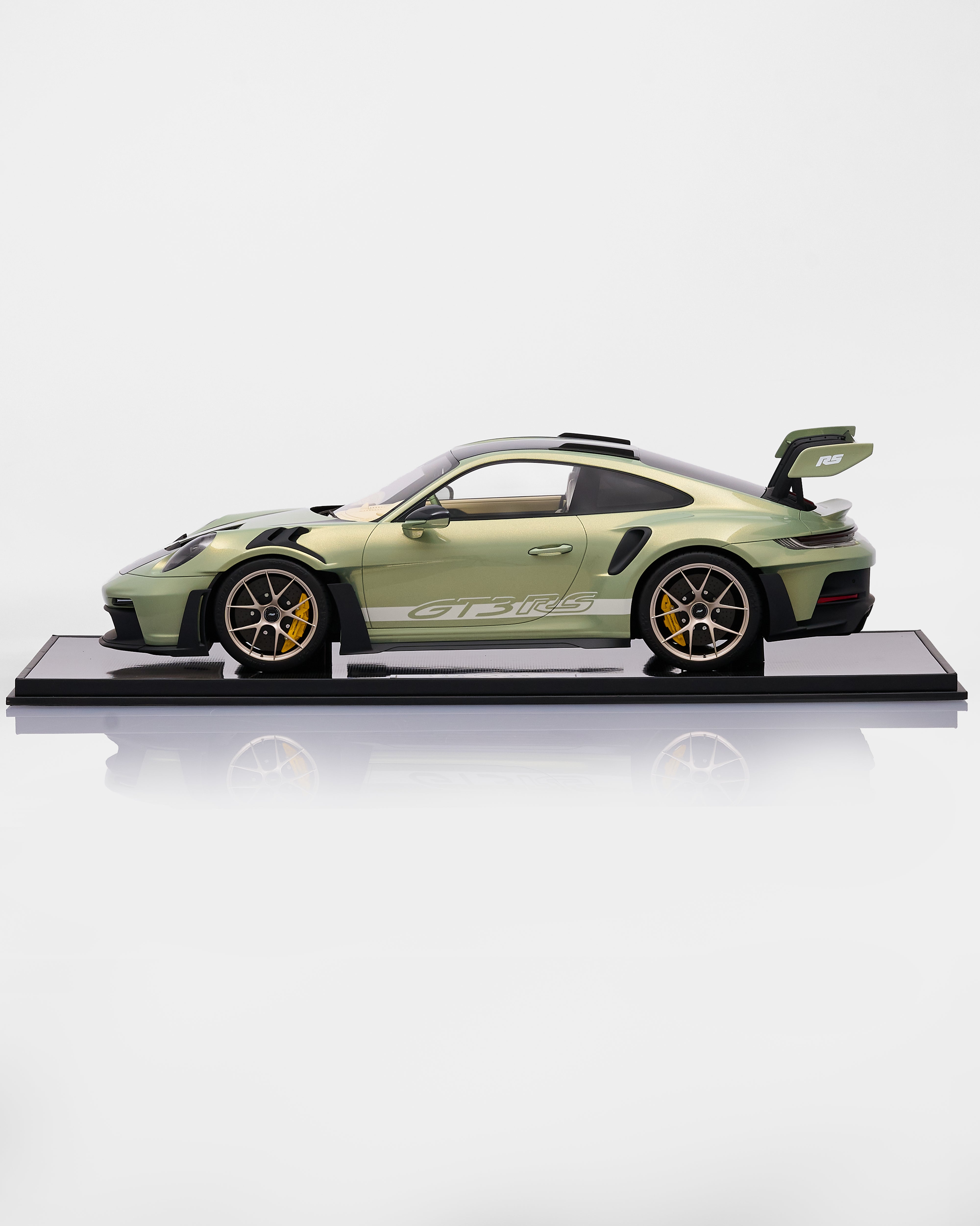 Model of a sports car Porsche 911 GT3RS Nato Olive Green on a white background