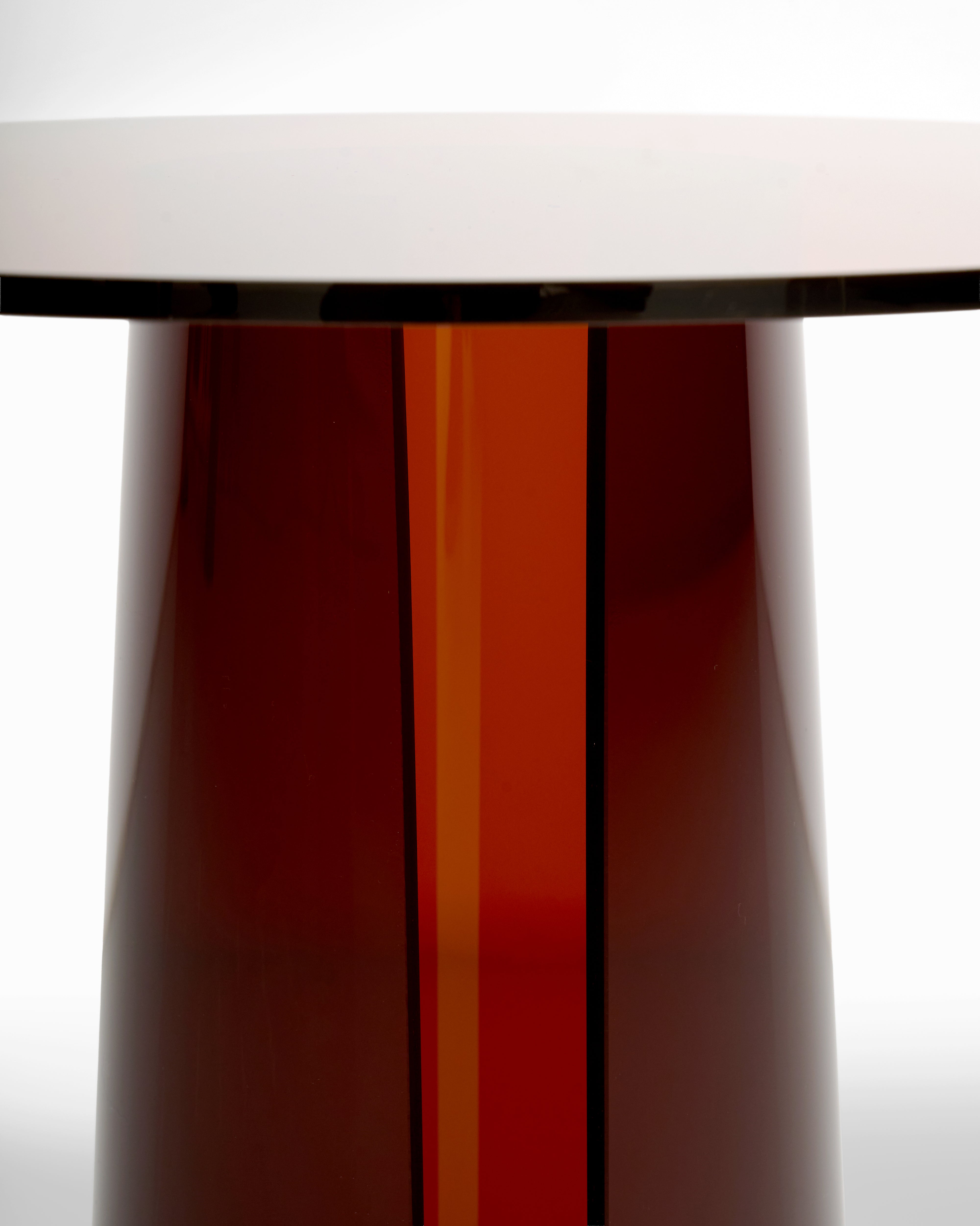Close-up of a split of acrylic side table on a white background