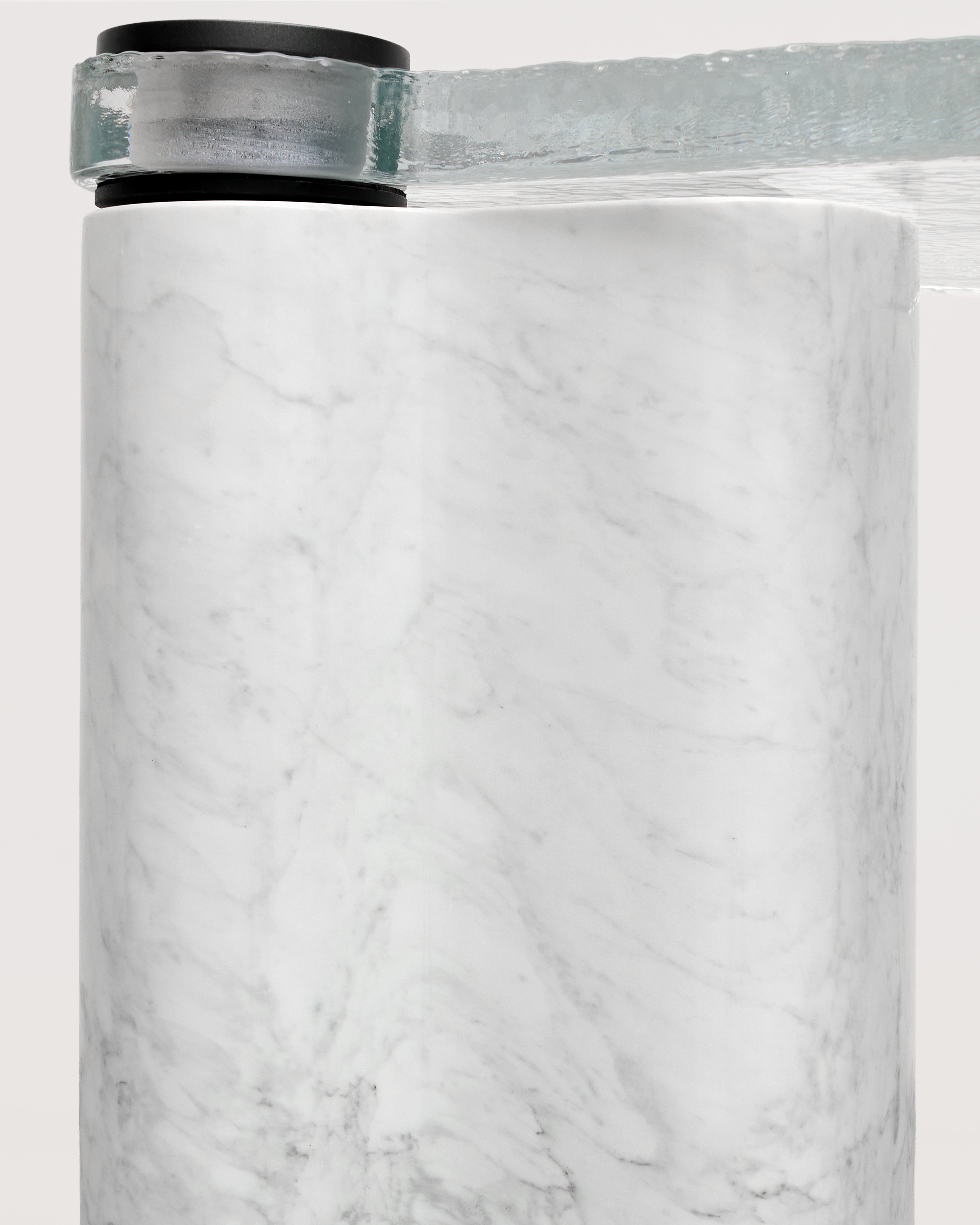 Close-up of a roll of white marble-leg of side table with a clear plastic cover.
