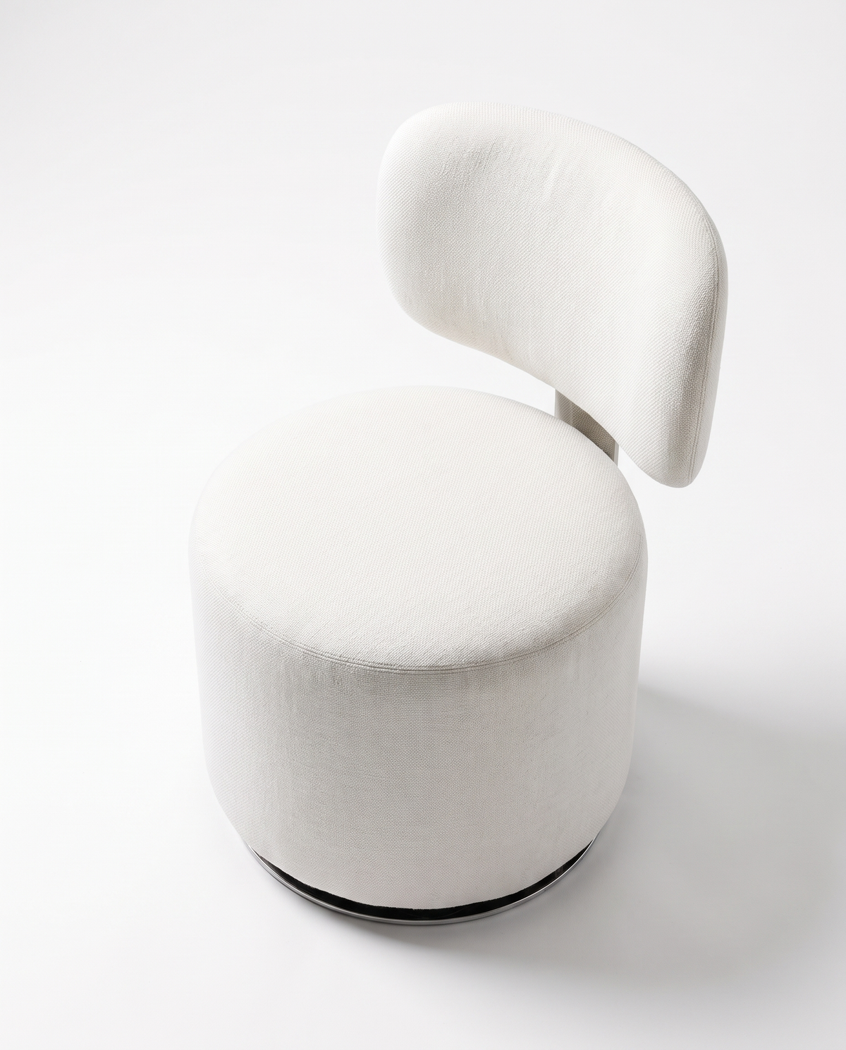 The Kenzie Swivel Armchair