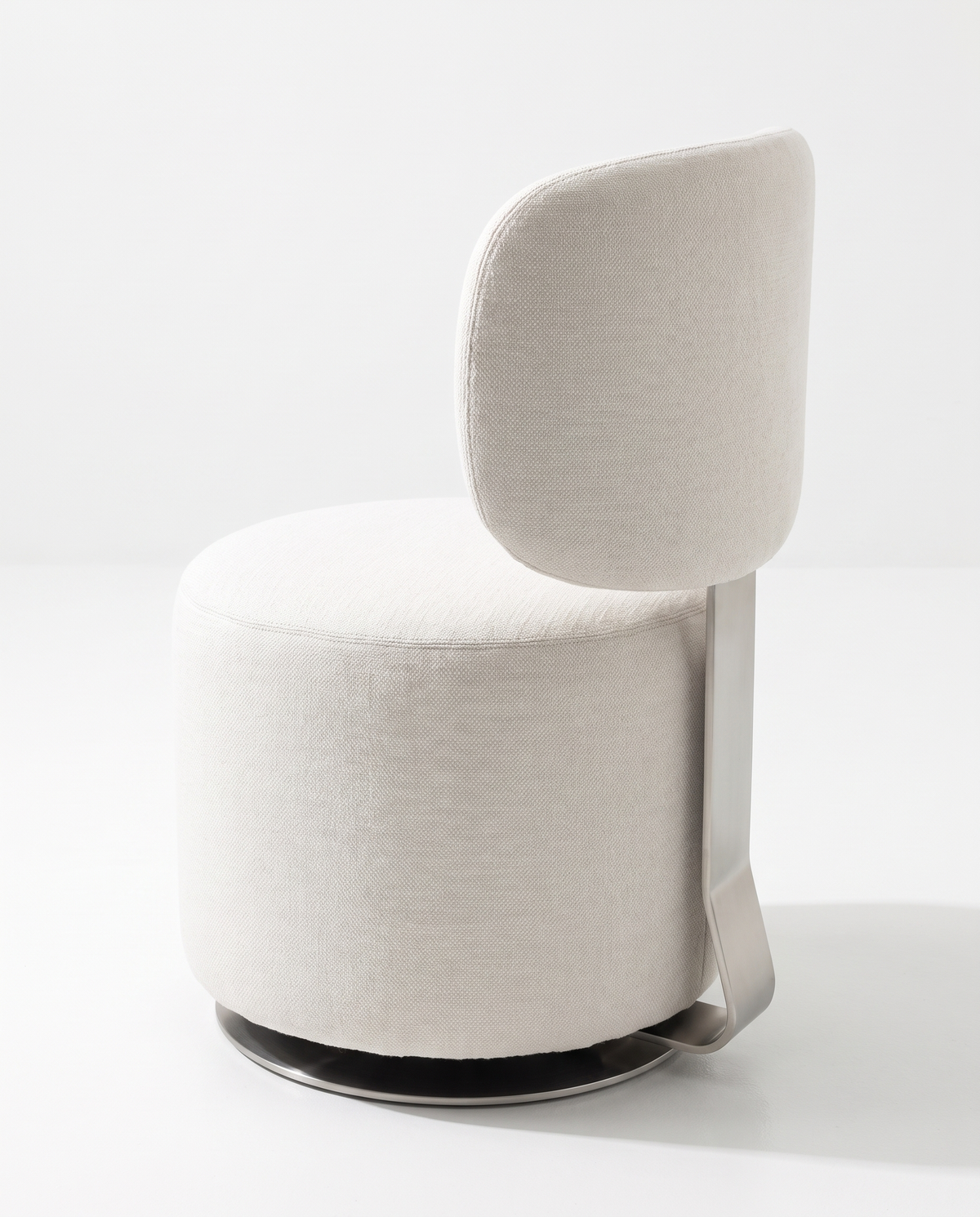 The Kenzie Swivel Armchair
