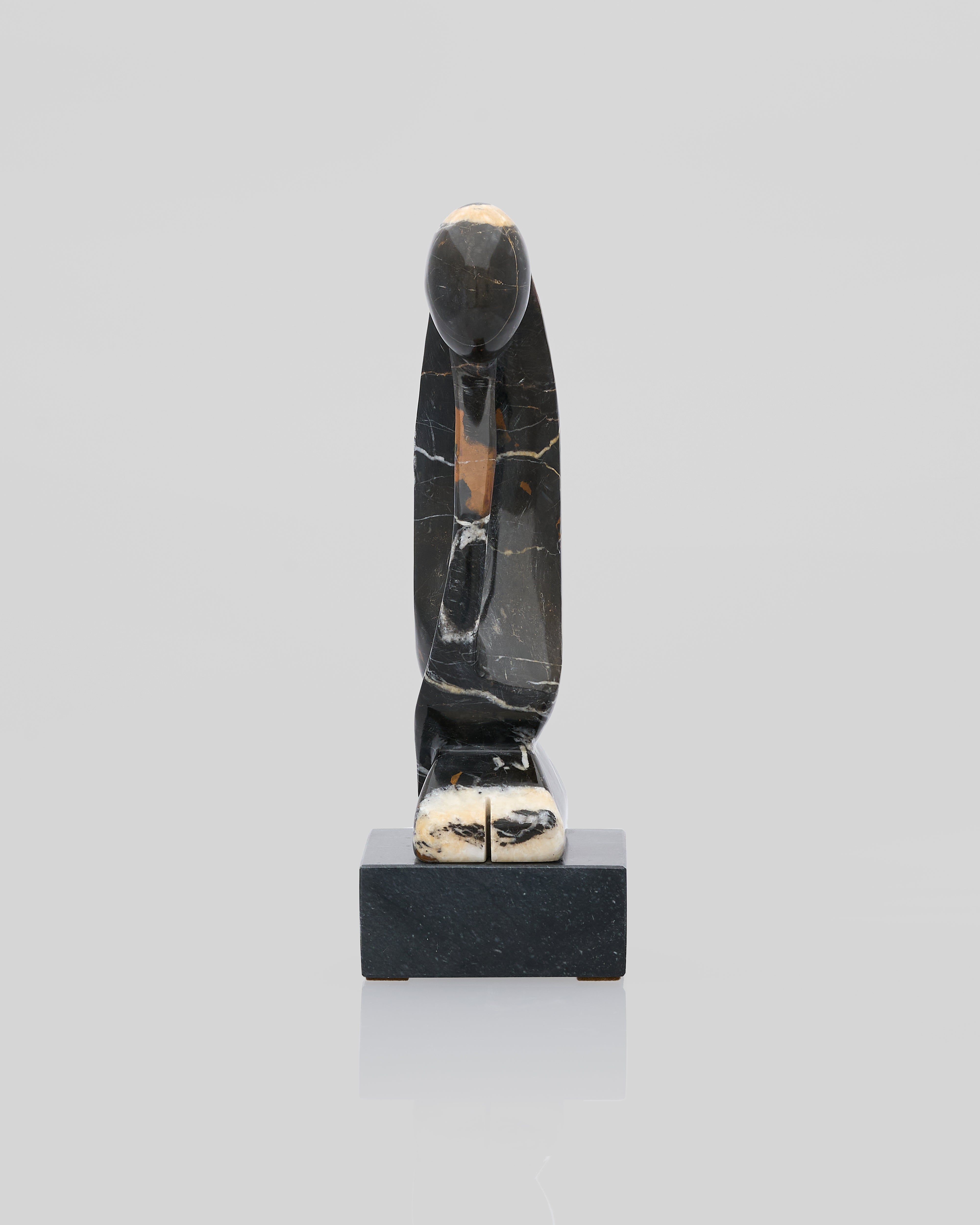 Black stone carving on a gray background for tabletop