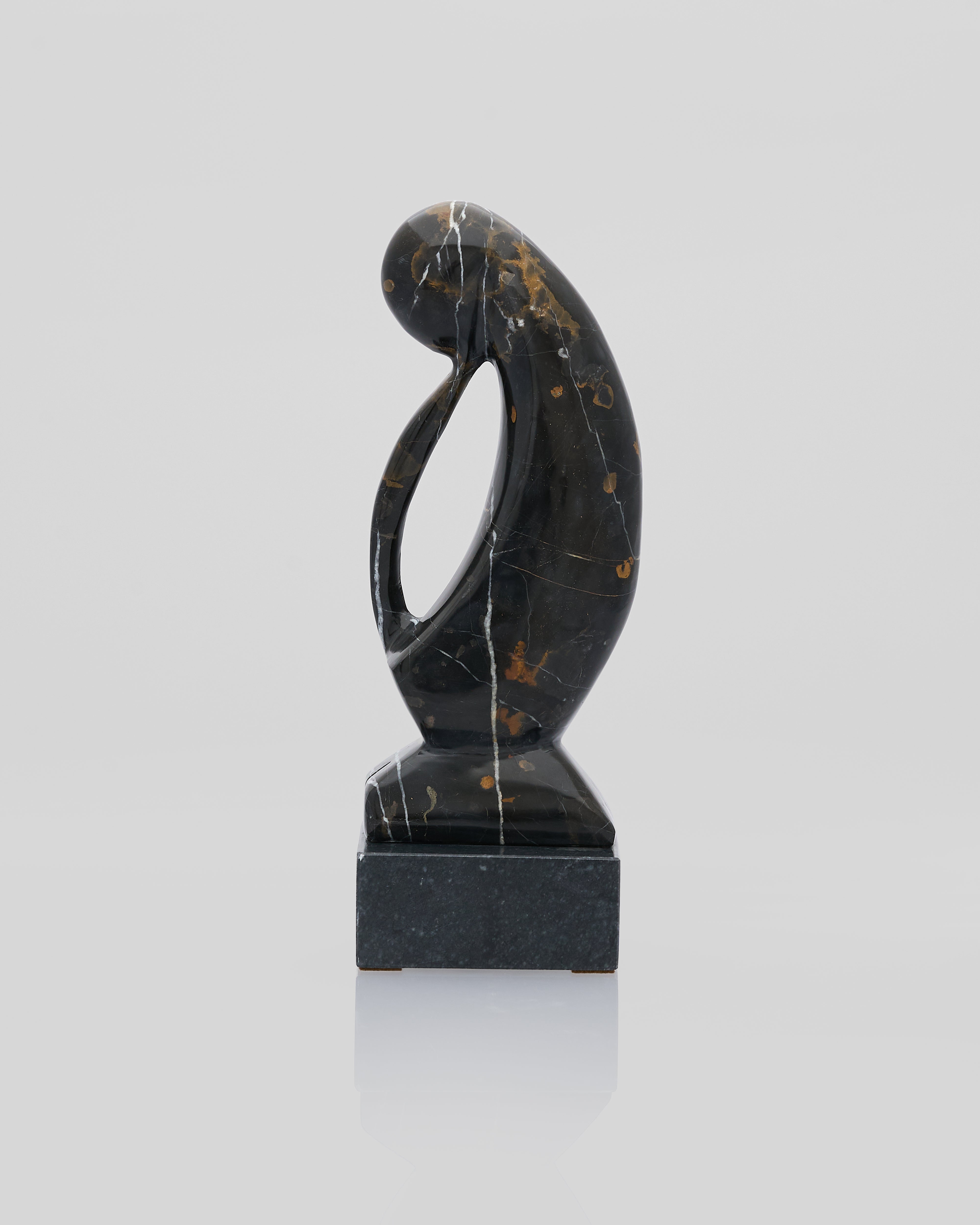Black marble sculpture for home and office decor with pure single cut marble