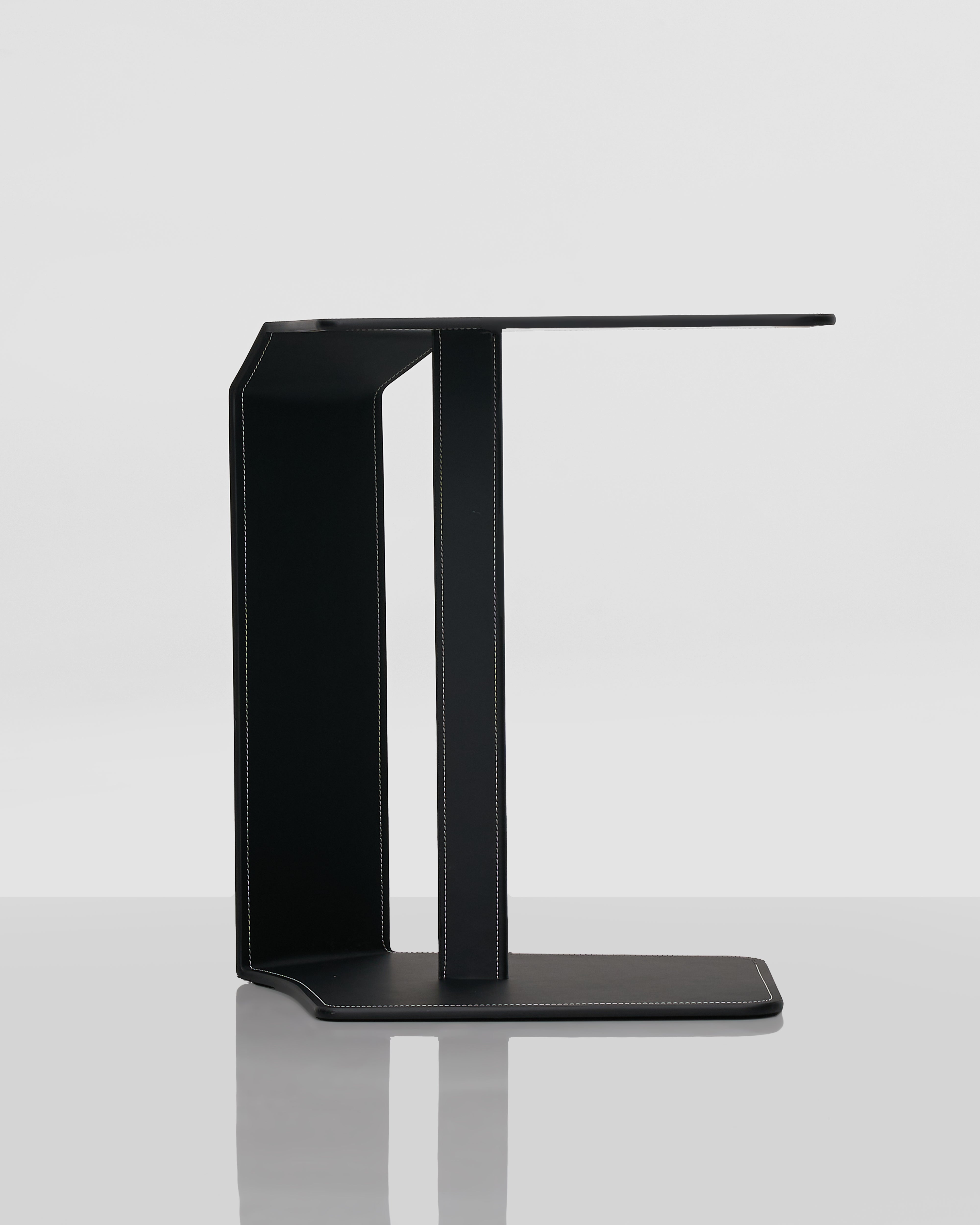 black modern leather covered side table for home and office