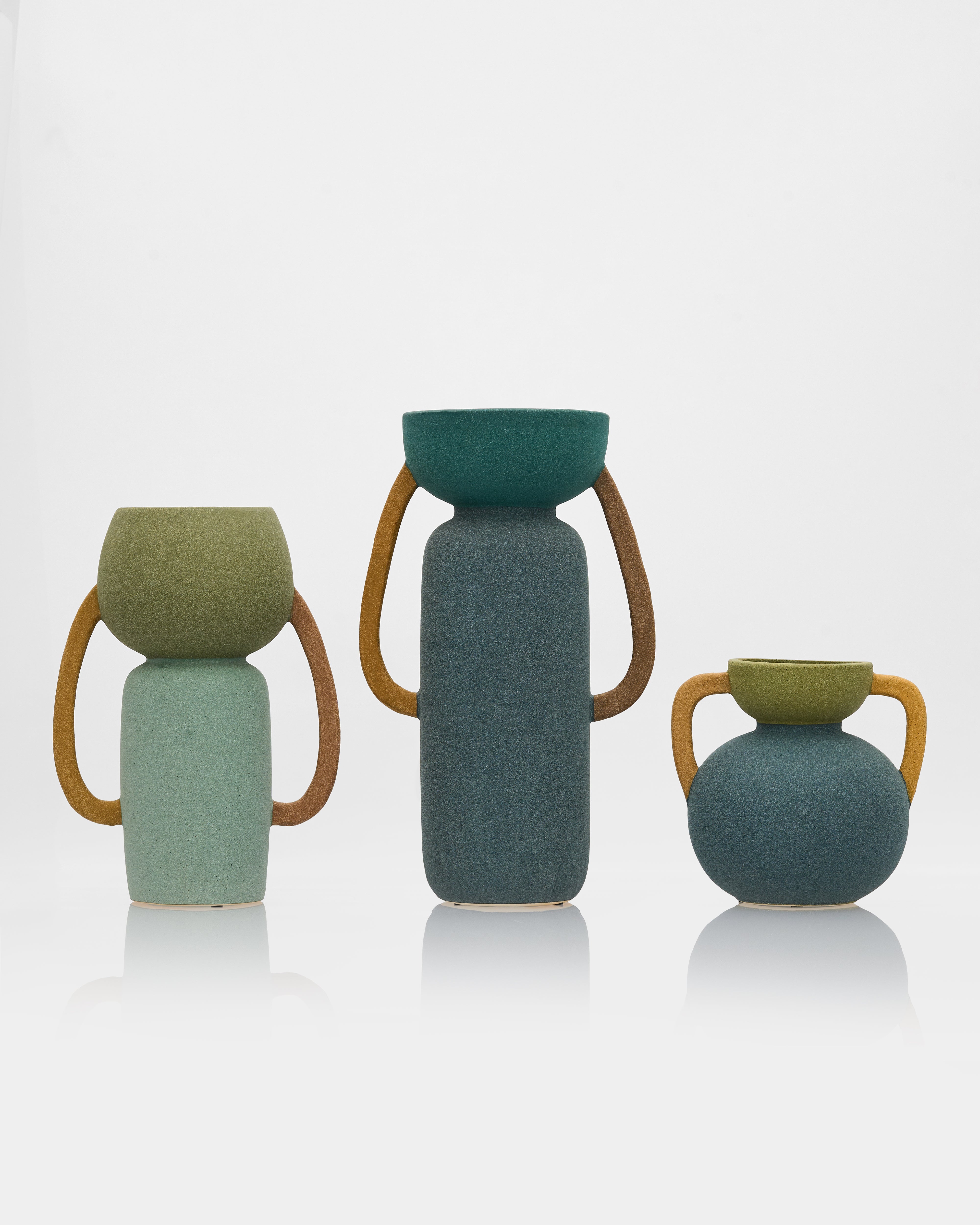 Detailed view of tumbler form ceramic decor emphasizing sculptural shape and premium craftsmanship