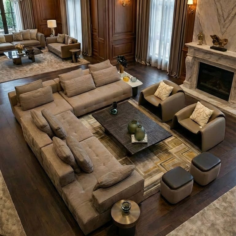 Luxurious living room with large sectional sofa, coffee table, and decorative elements.