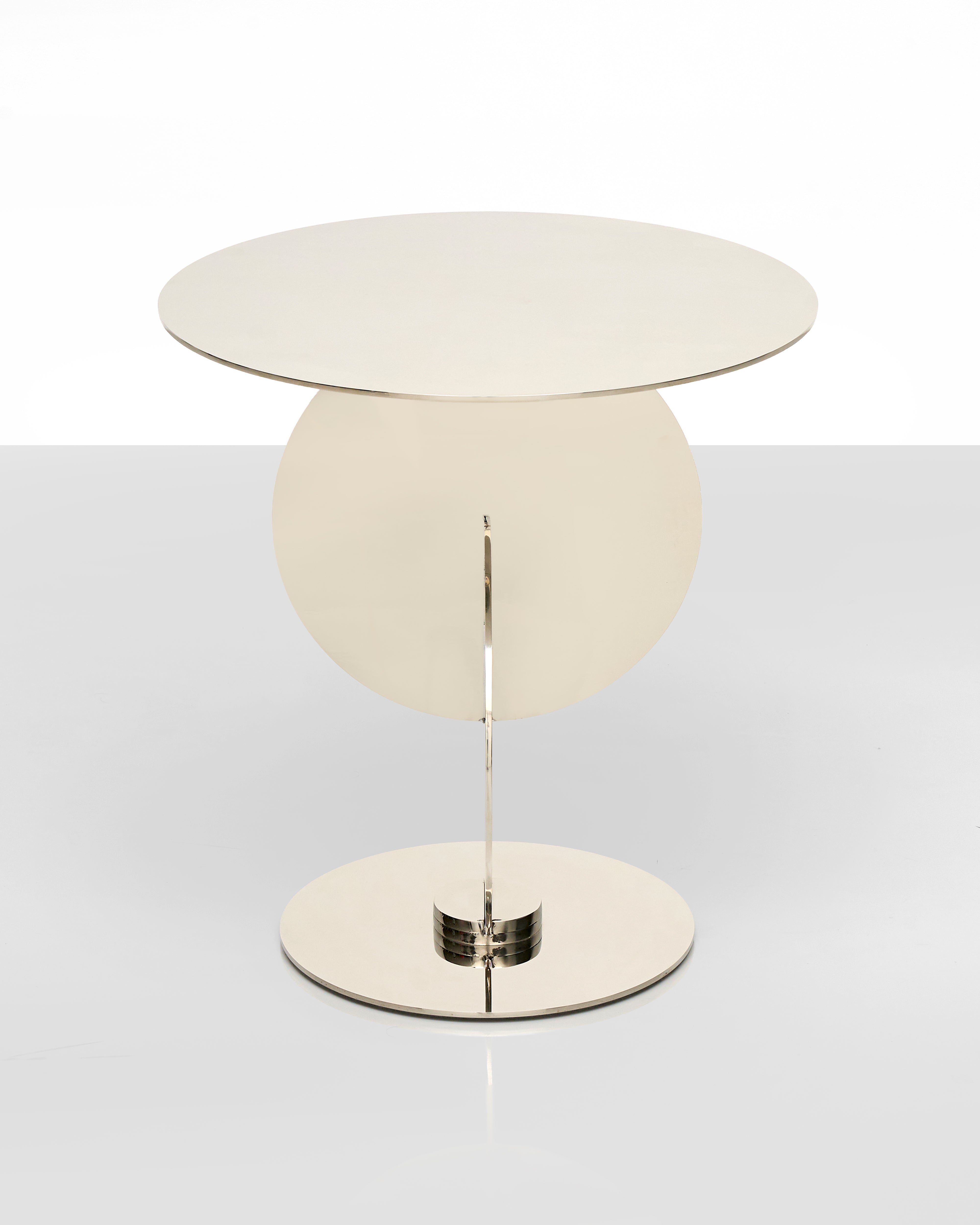 Modern side table with a round design on a white background