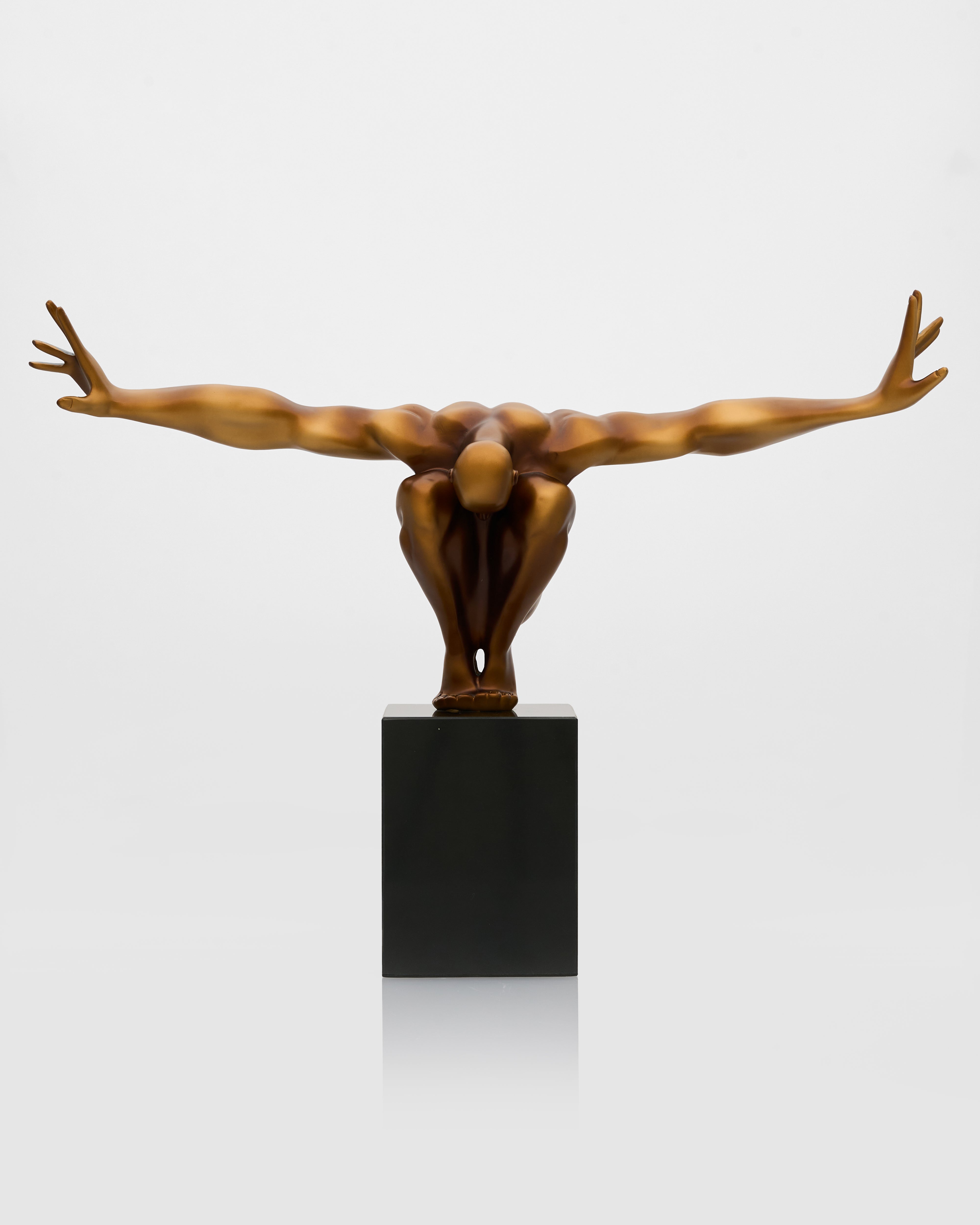 Athletic male posture sculpture styled as luxury home décor accent for modern and contemporary interiors