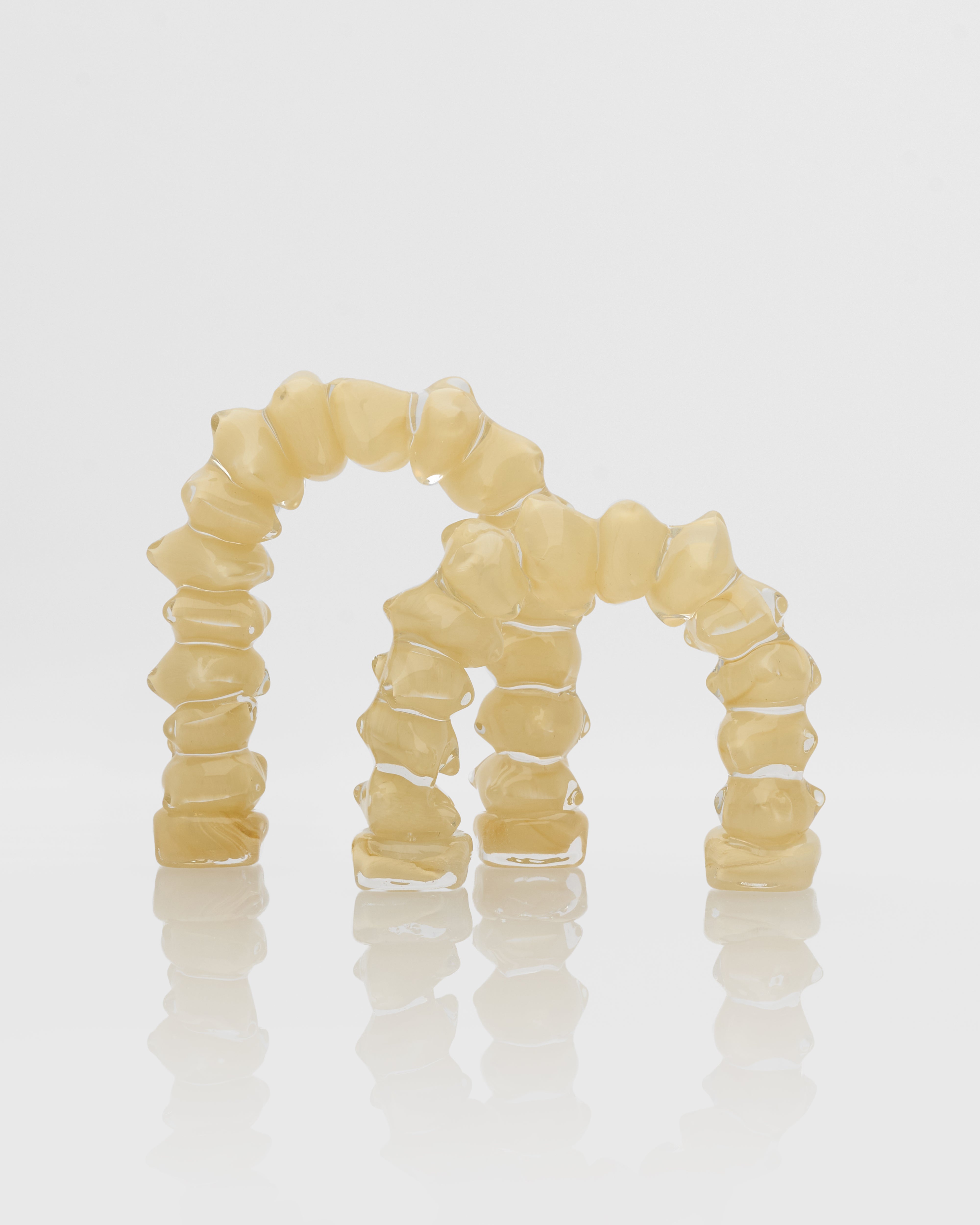 Set of dental aligners on a light gray background