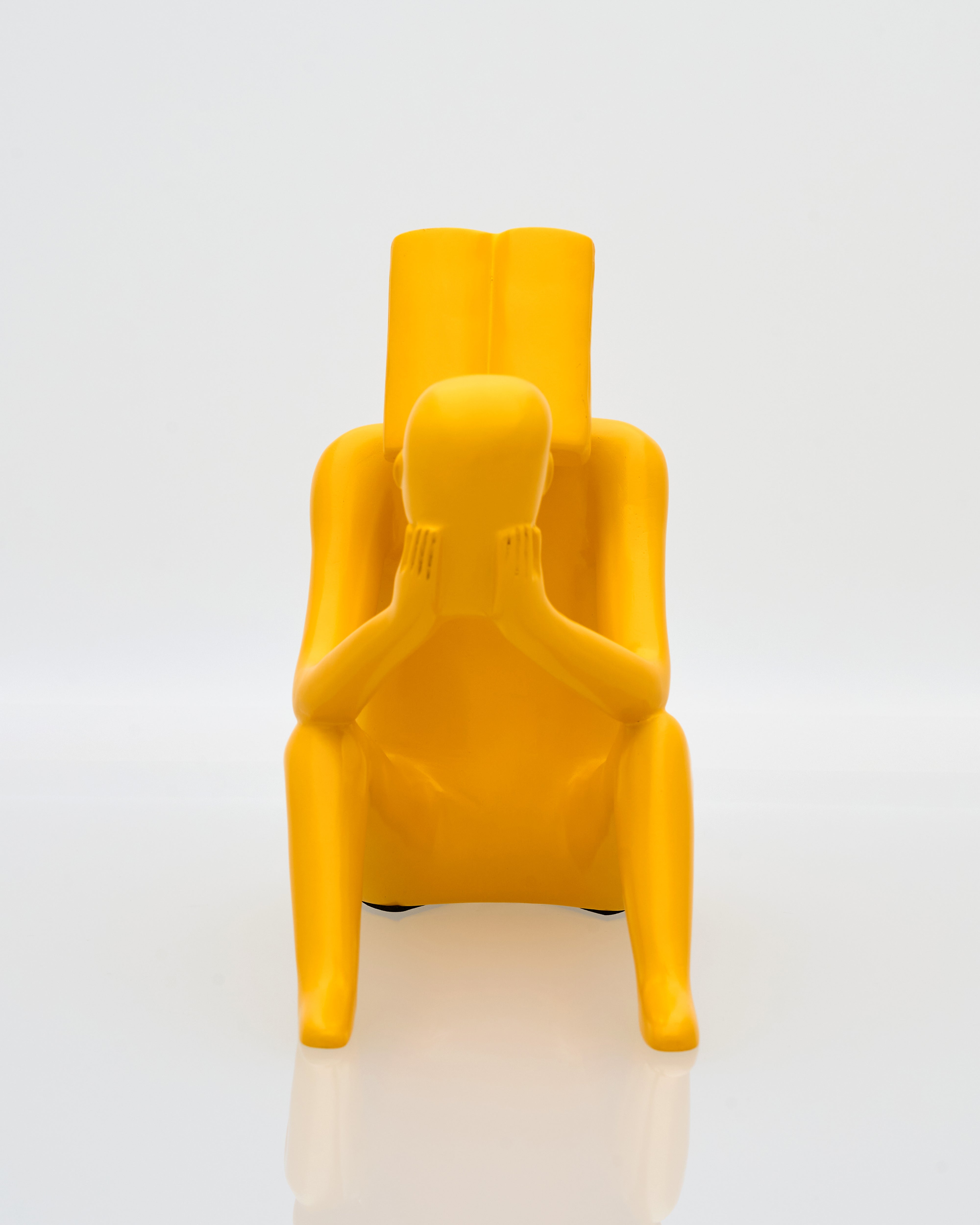 Yellow book reader with a unique design on a white background