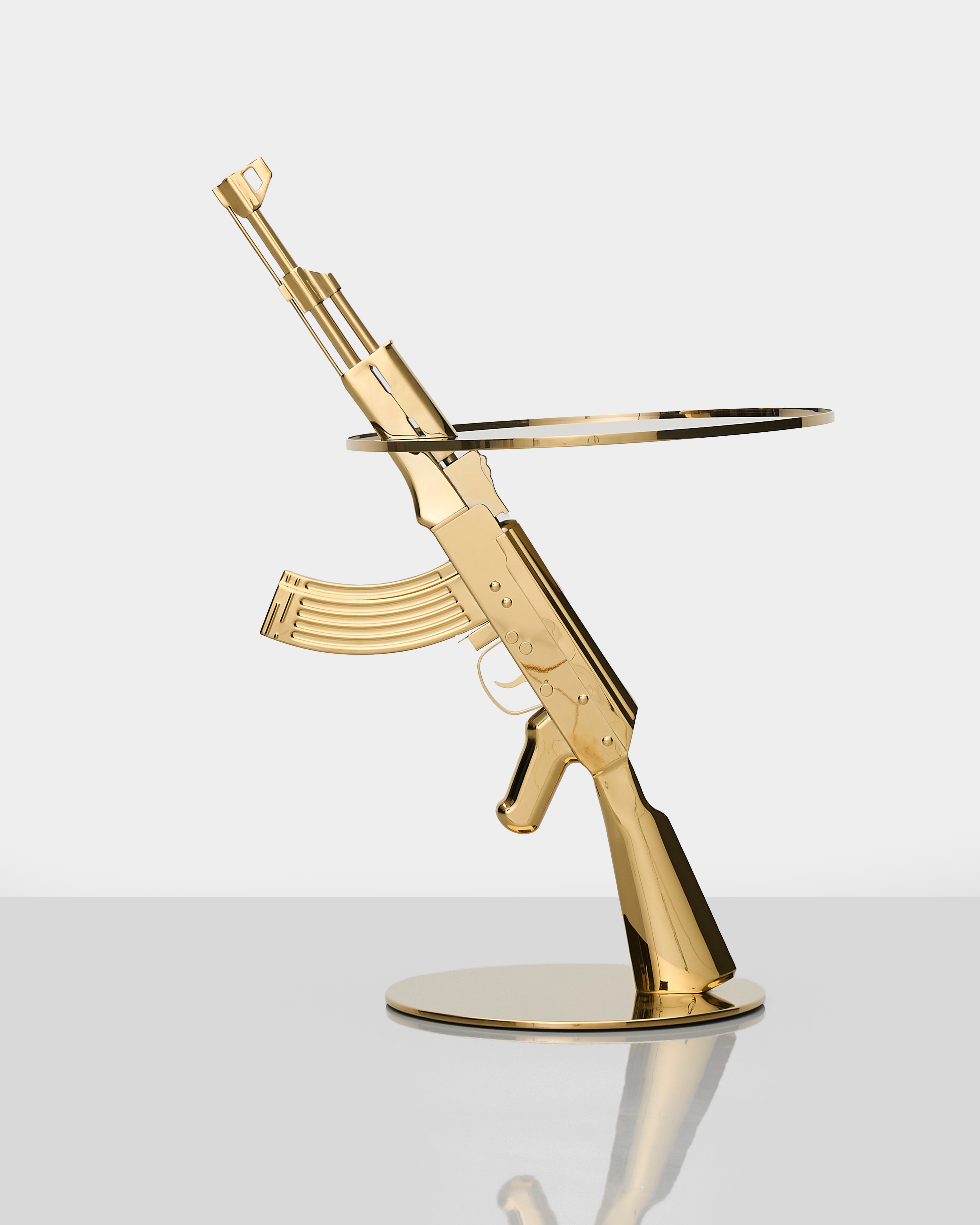 Side view of Bolt Side Table highlighting architectural rifle-textured base and polished golden surface