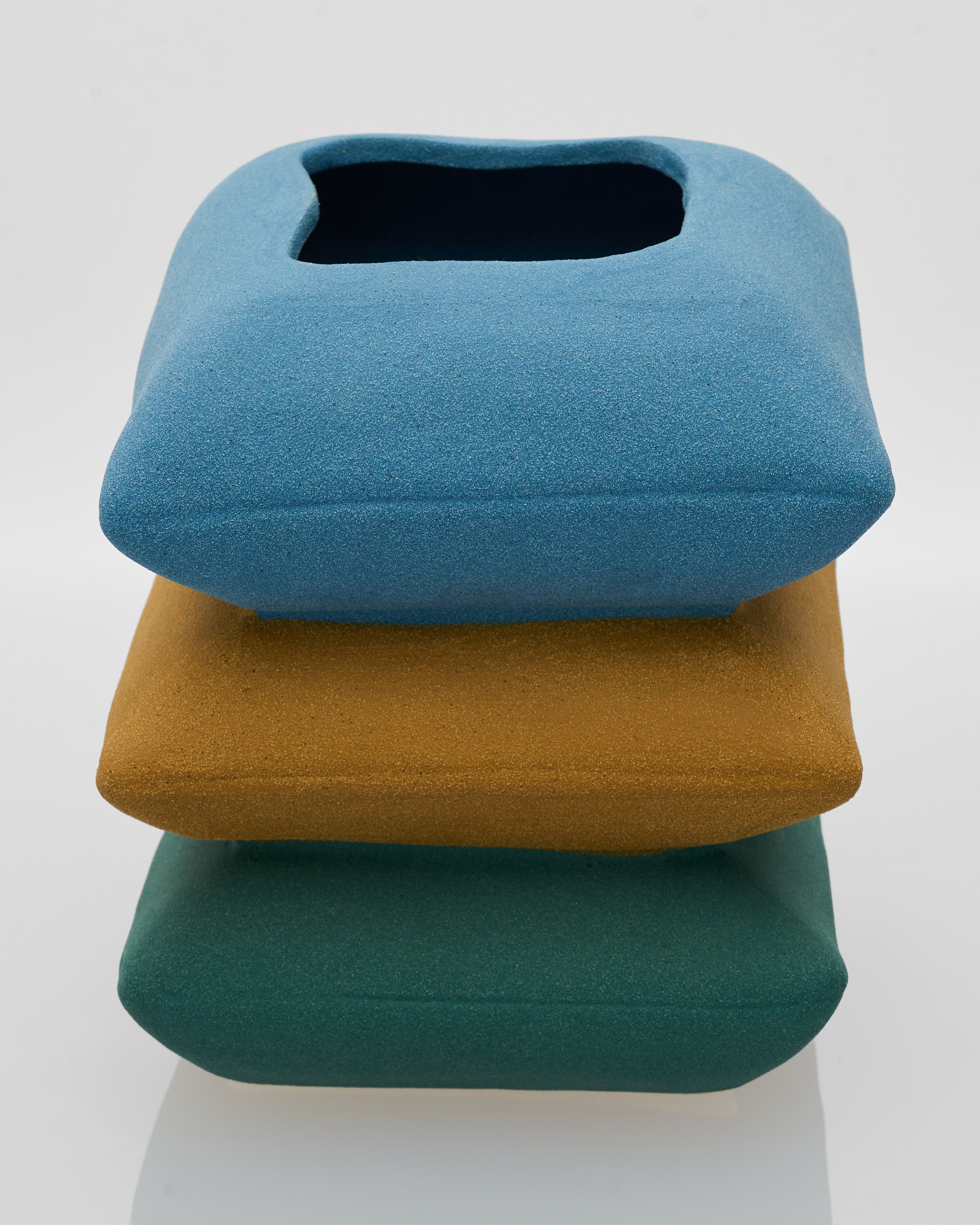Ceramic Pillow Deck 3 Layered angled view showcasing sculptural design and sophisticated ceramic detailing