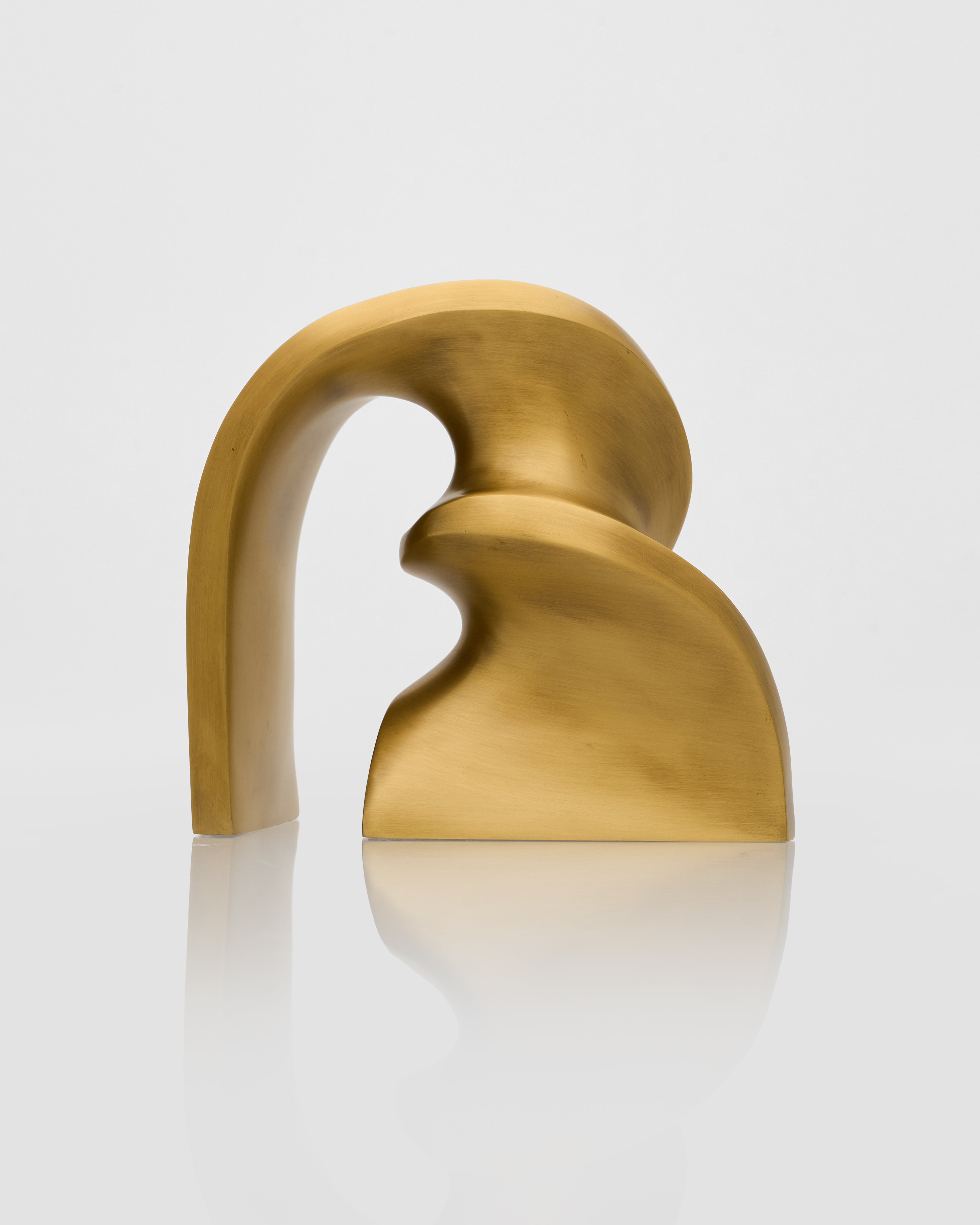 Gold door handle on a white background