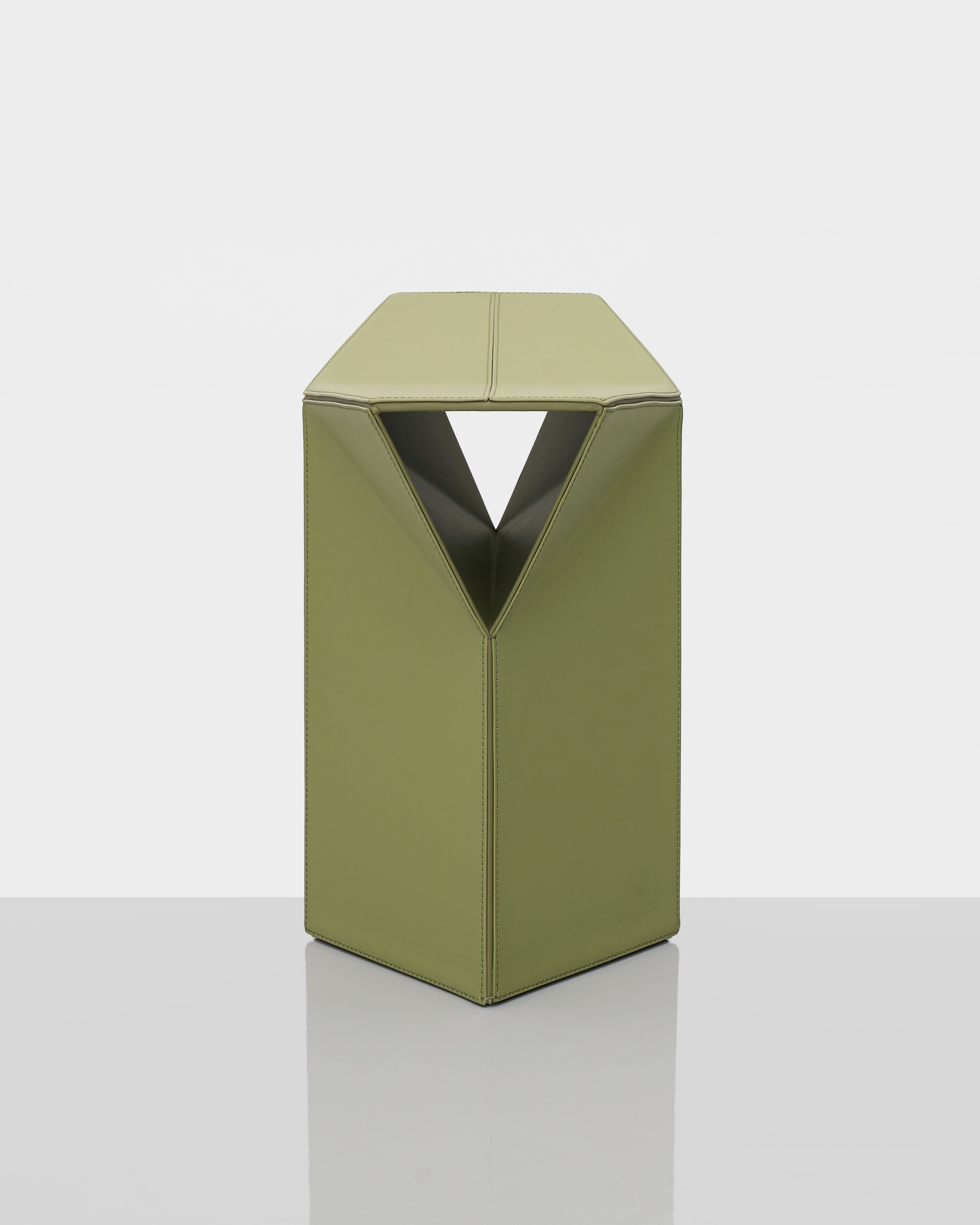 Diamond-Form Conical Leather Side Table angled view showing sculptural geometry and premium olive green leather finish