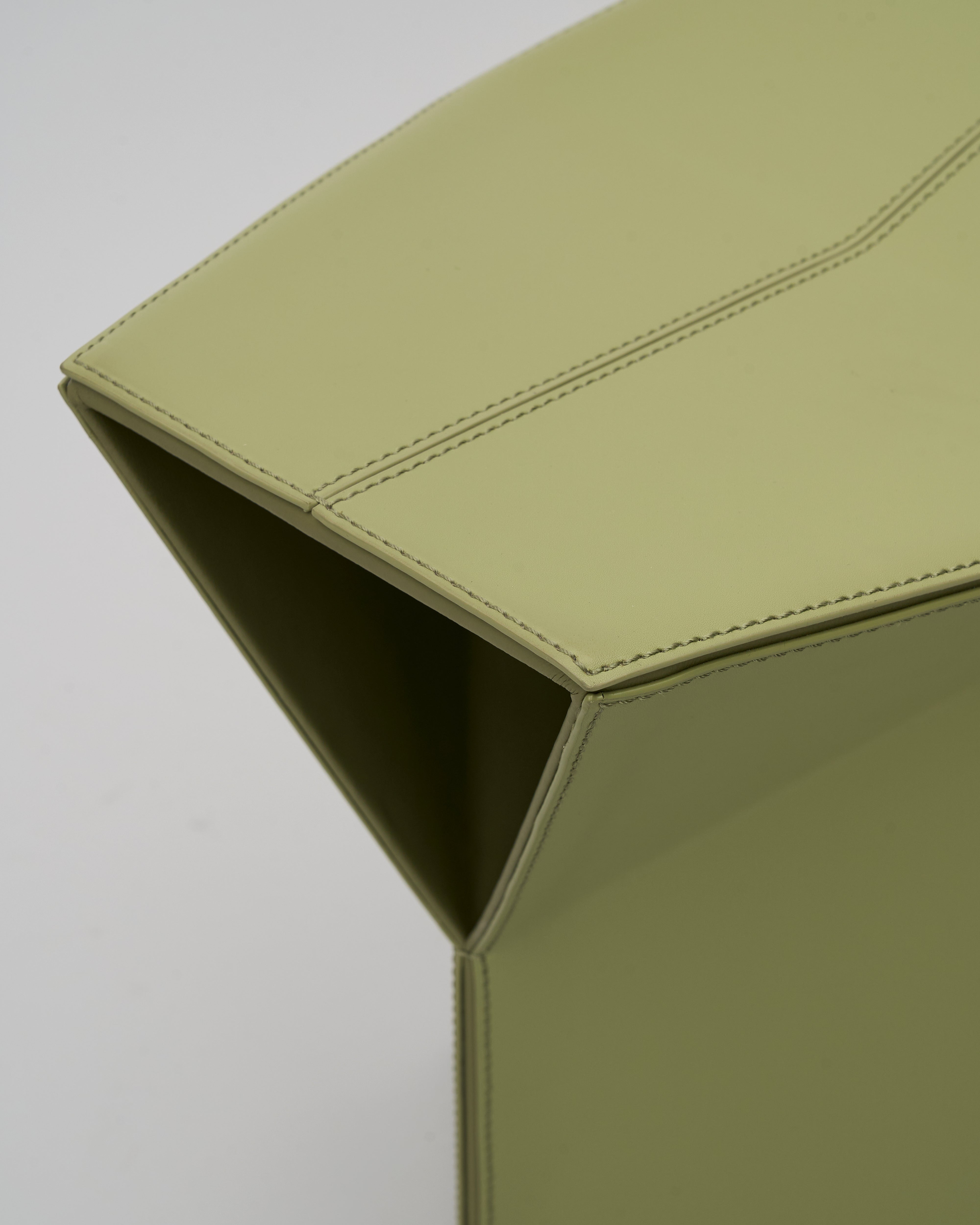 Detailed texture and finish of Diamond-Form Conical Leather Side Table showing superior craftsmanship and contemporary style