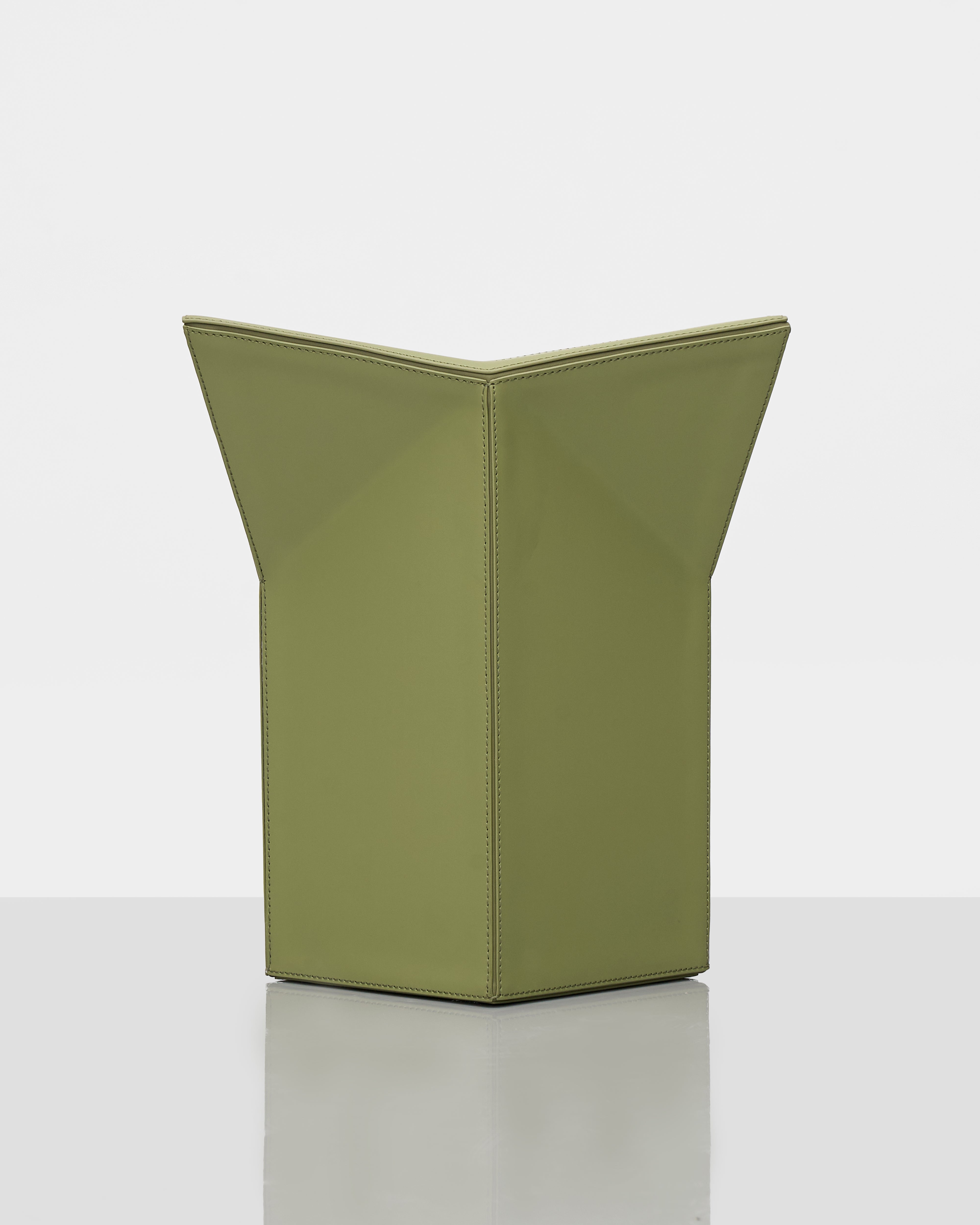 Diamond-Form Conical Leather Side Table styled in modern interiors adding sophisticated architectural elegance