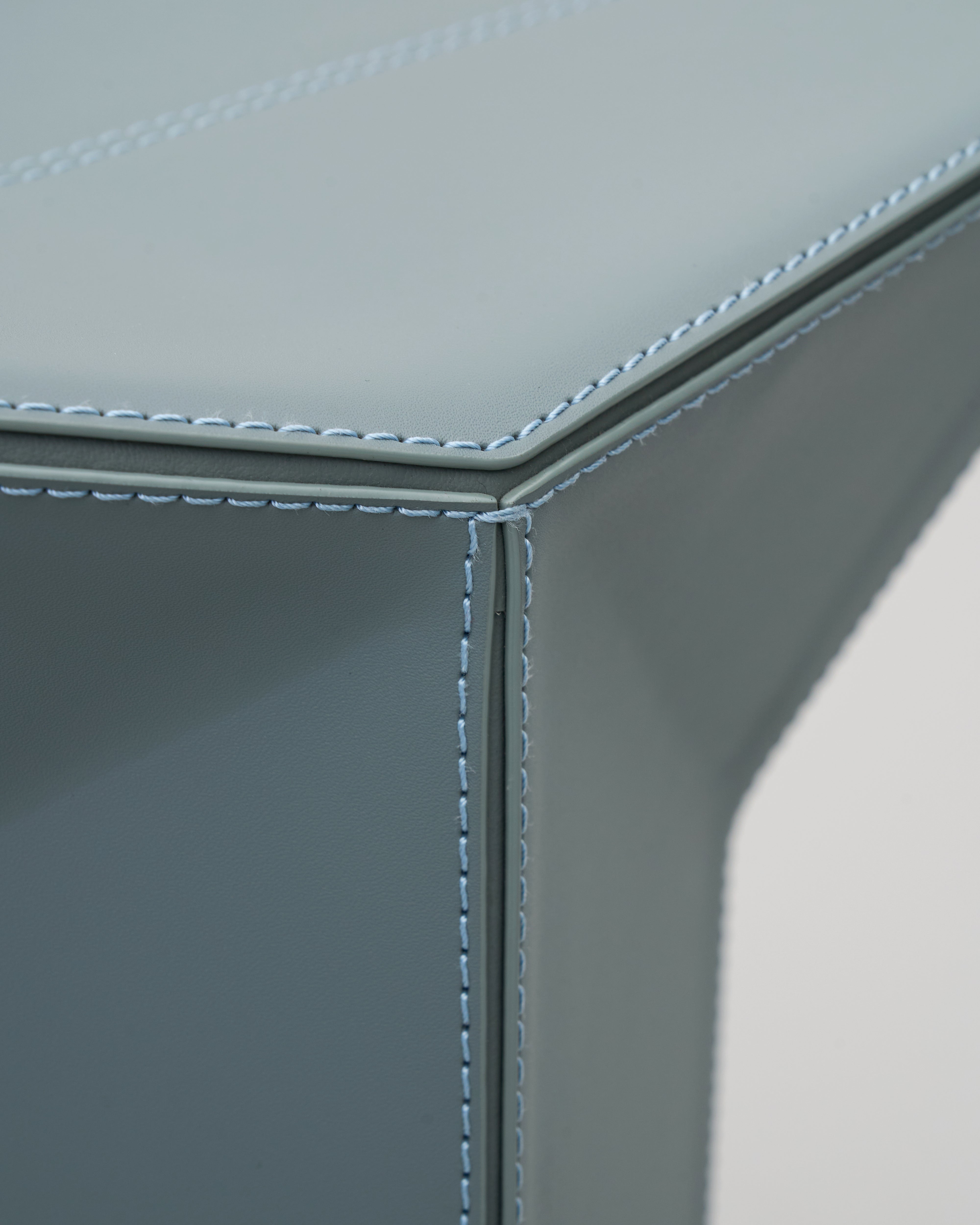 Detailed view of Diamond-Form Conical Leather Side Table emphasizing conical shape and high-quality leather accents