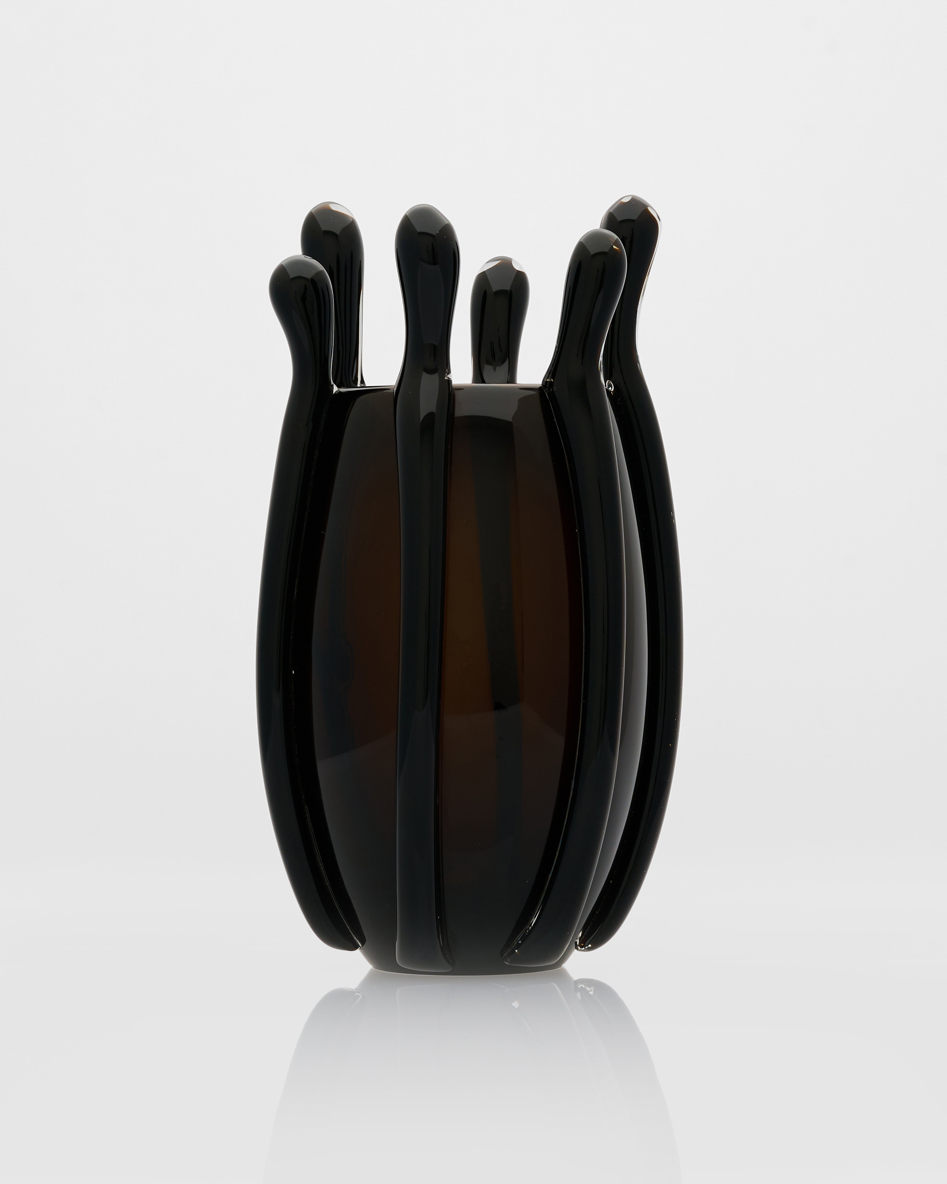Detailed view of Drop Tail Modern Vase emphasizing sculptural curves and luxury glaze finish