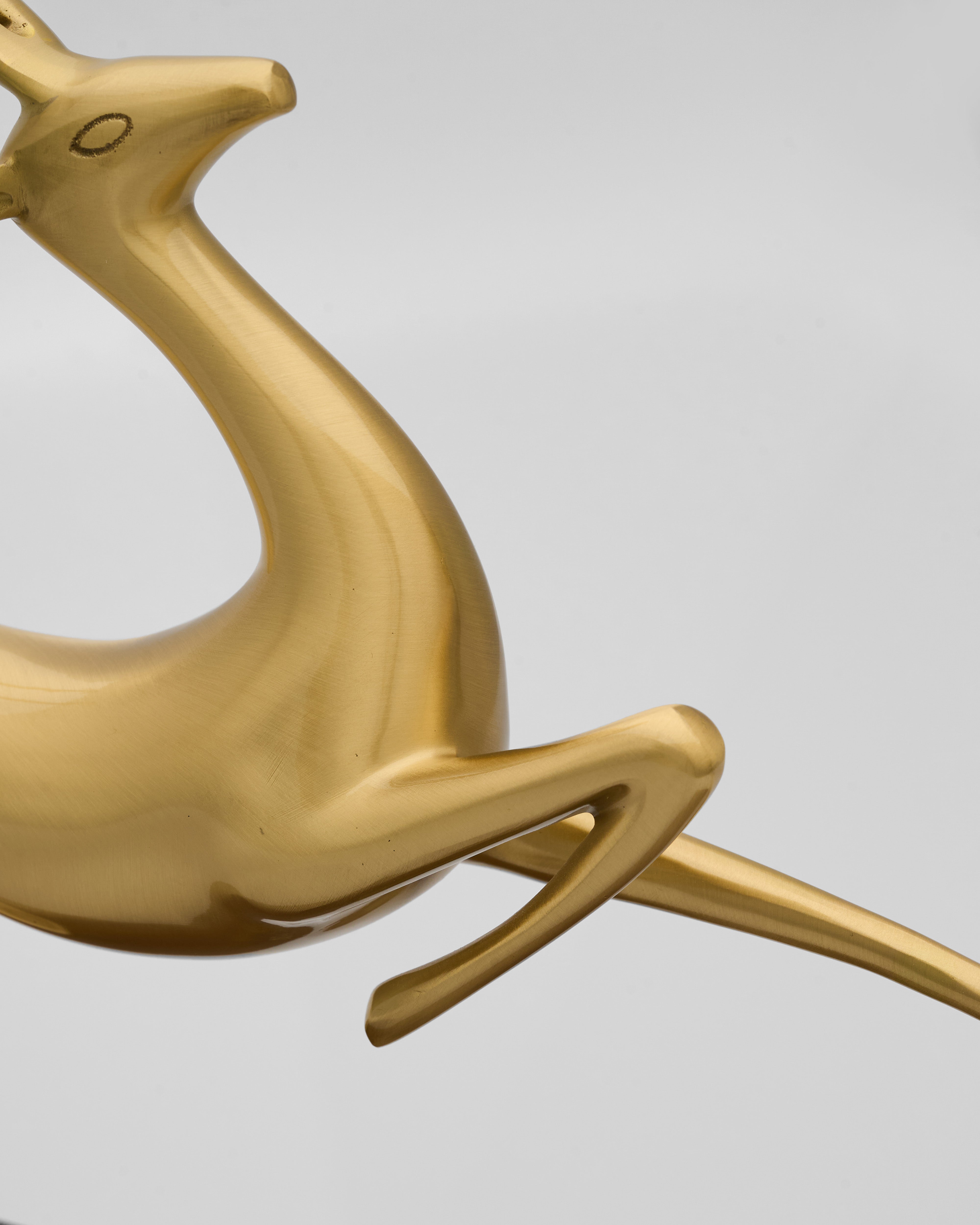 Detailed view of dynamic deer decor emphasizing sculptural contours and luxury finish