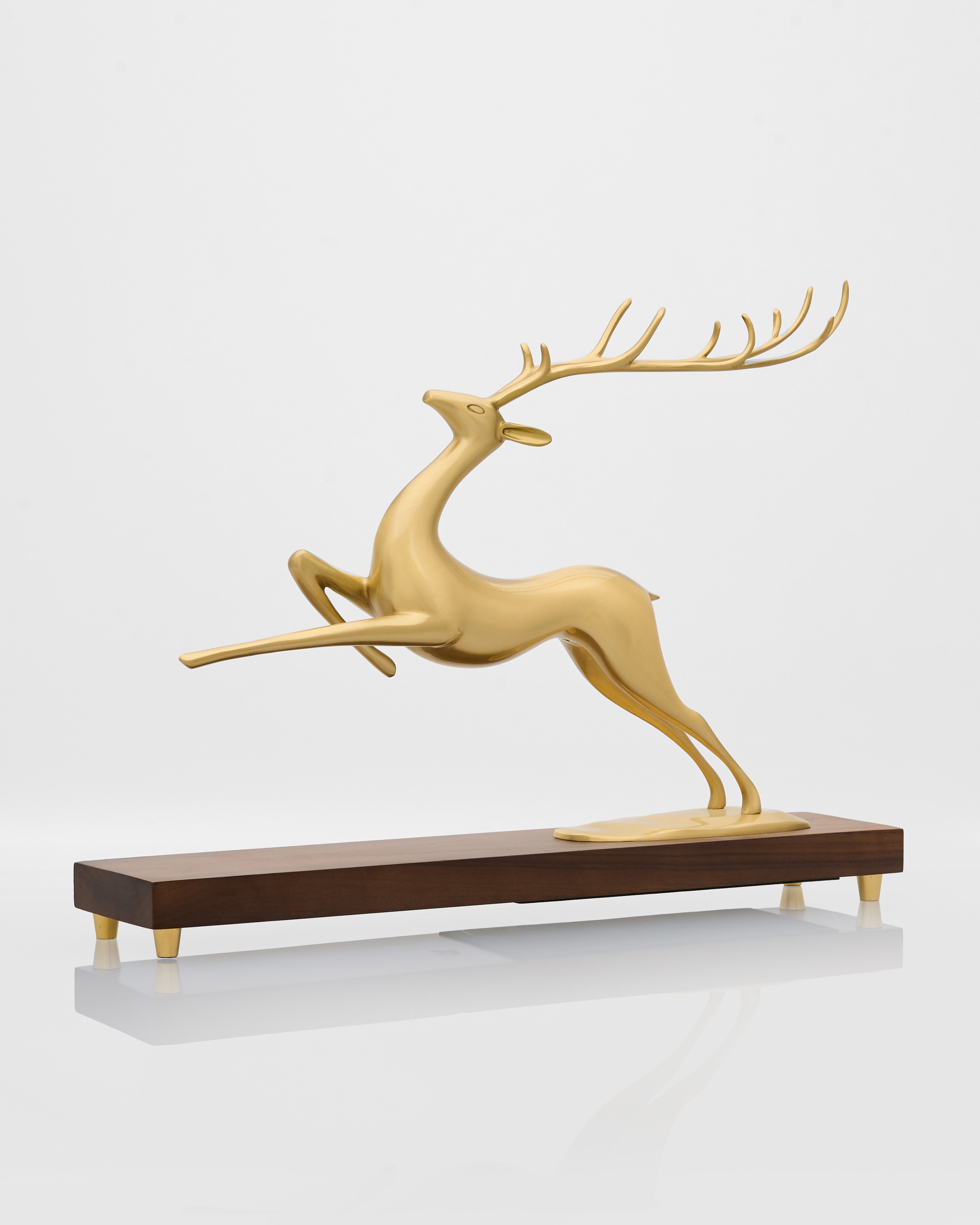 Dynamic deer decor luxury home accent featuring leaping deer sculpture with refined artistic detailing