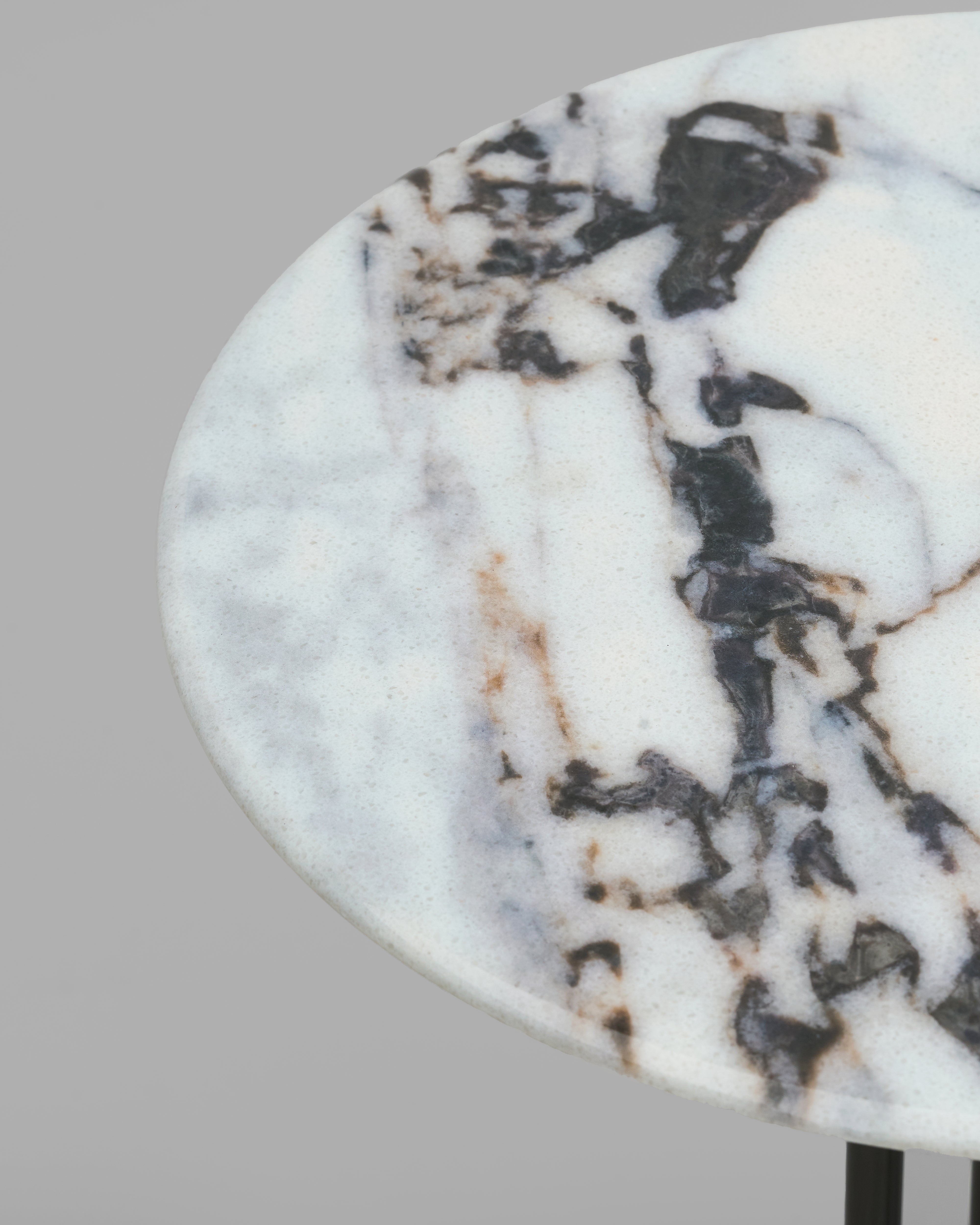 Close-up of marble surface on Echo side table showing natural veining and premium stone quality