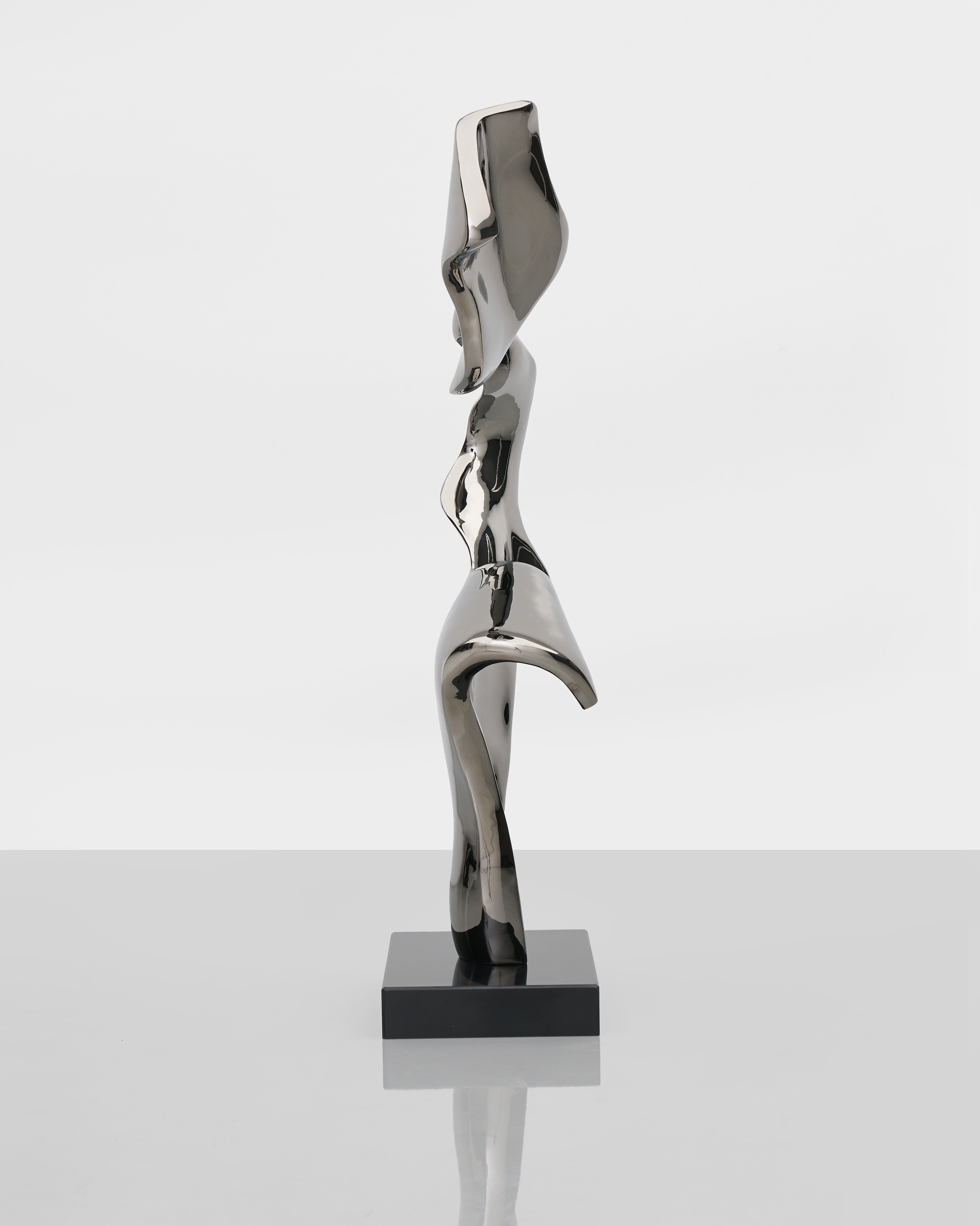 Close-up of Eternal Silver Sculpture highlighting silver finish and intricate sculptural details