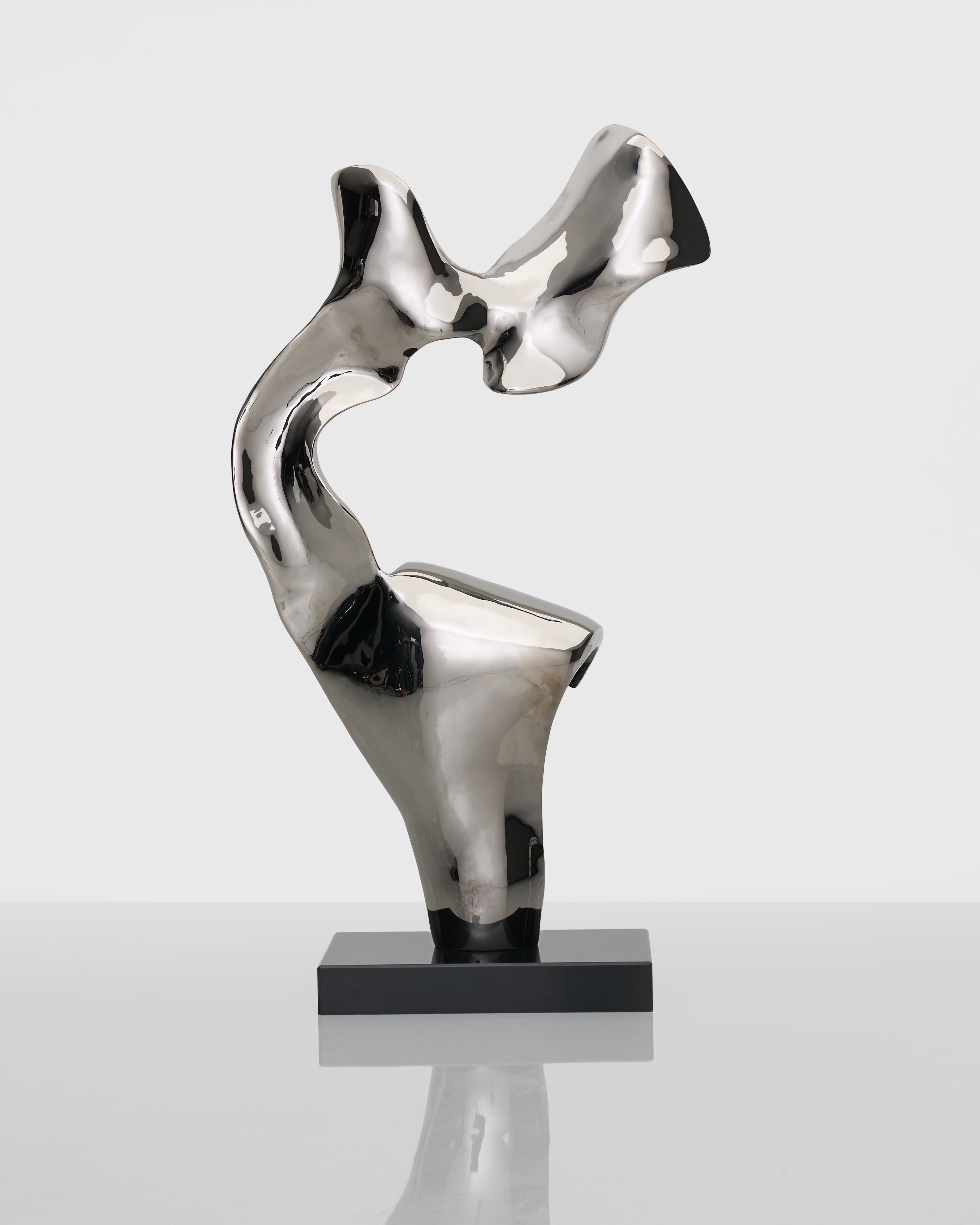Side view of Eternal Silver Sculpture highlighting dynamic form and robust metal core