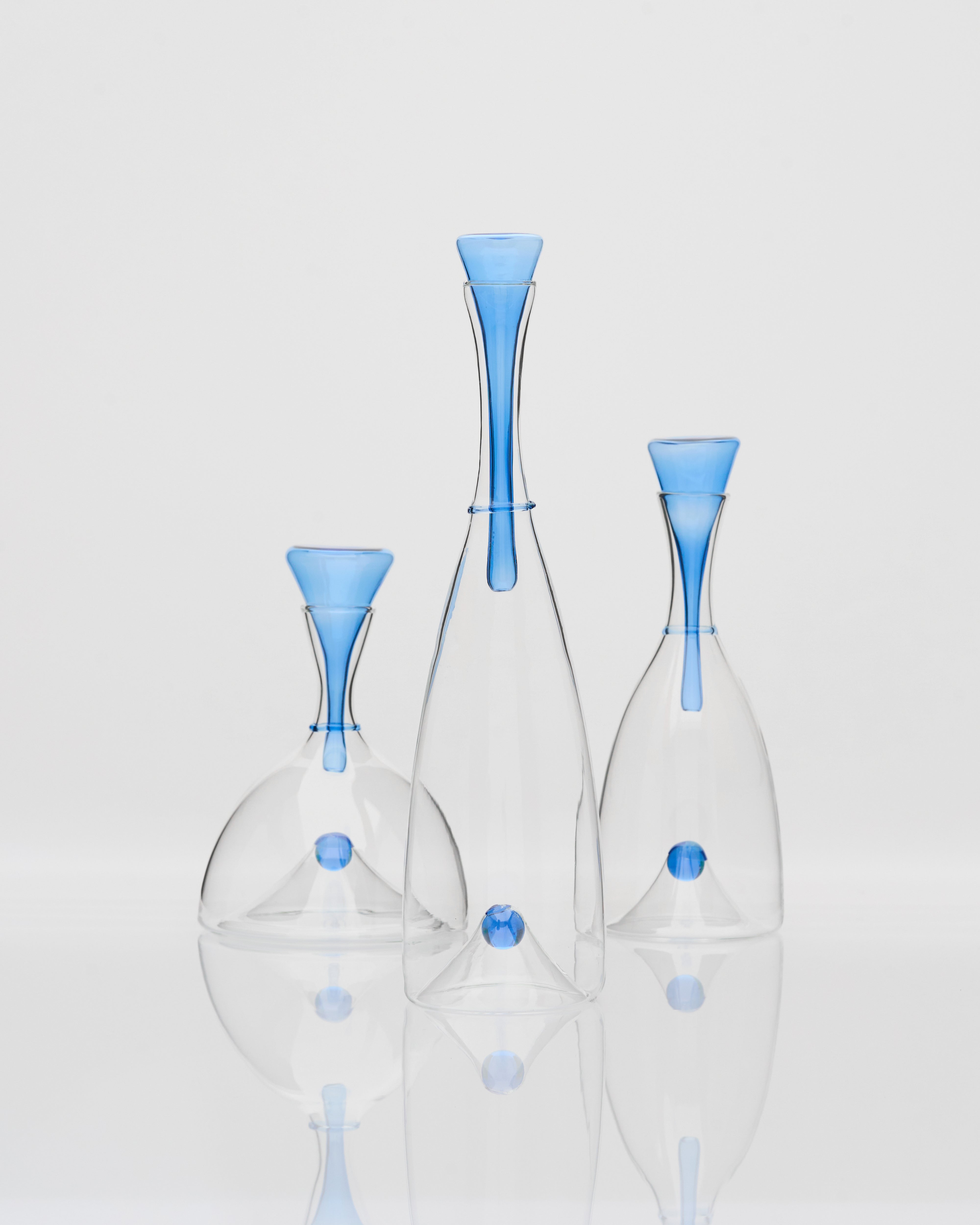 Side view of hour glass inspired ornament set highlighting elegant curves and premium decorative detailing