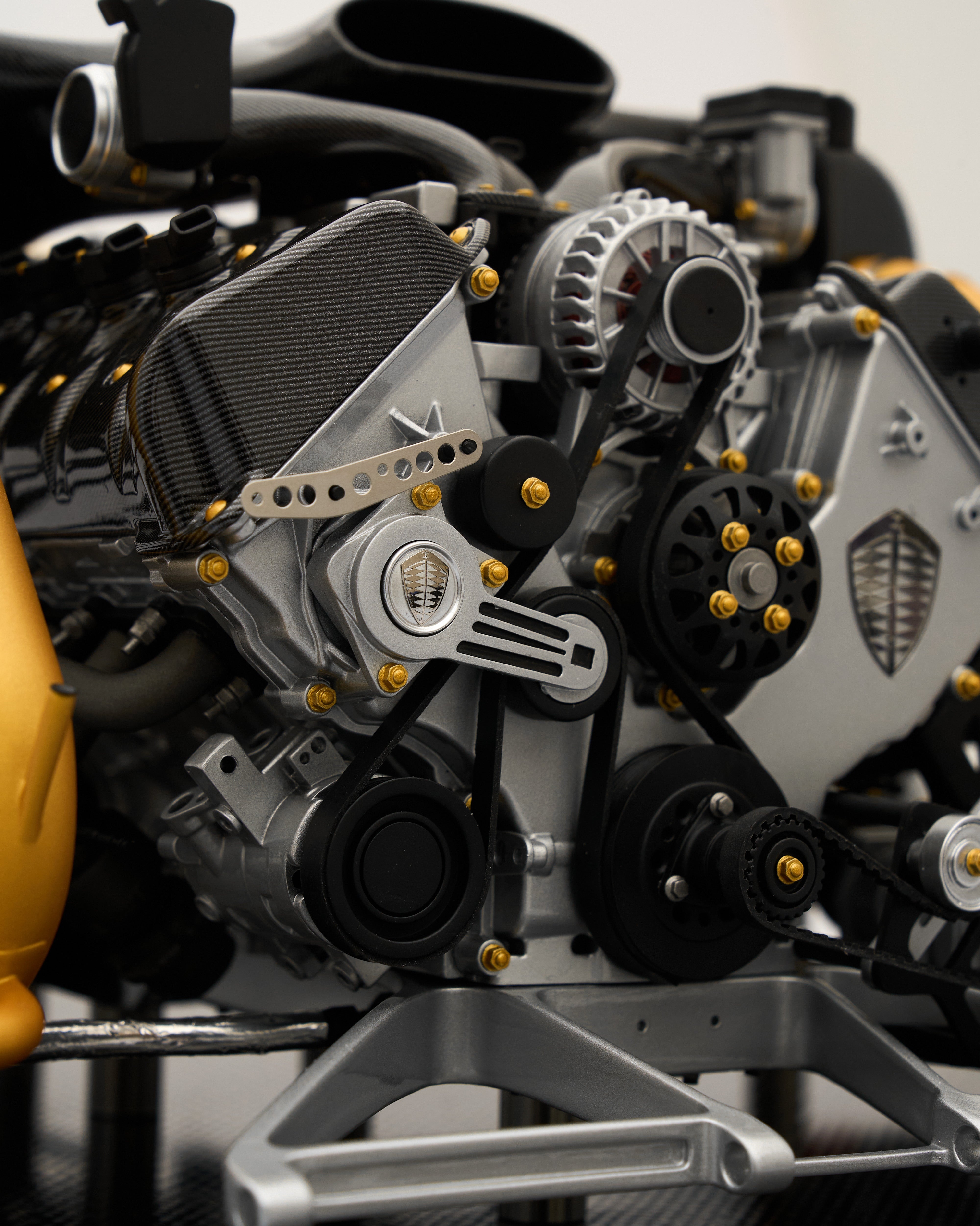Close-up of a car engine with visible brand logo