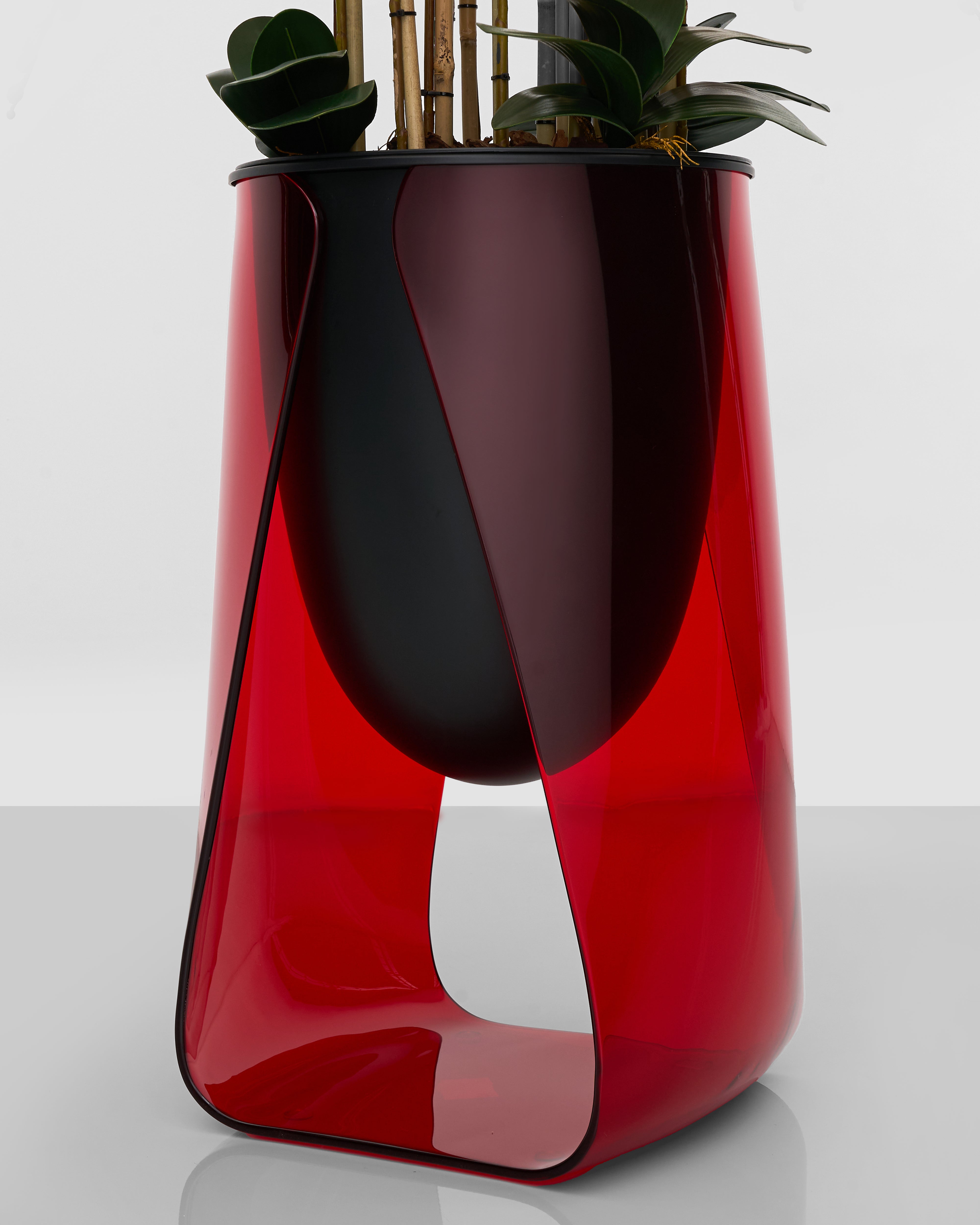 Close-up of Lark Planter detailing glossy red glaze and high-quality craftsmanship