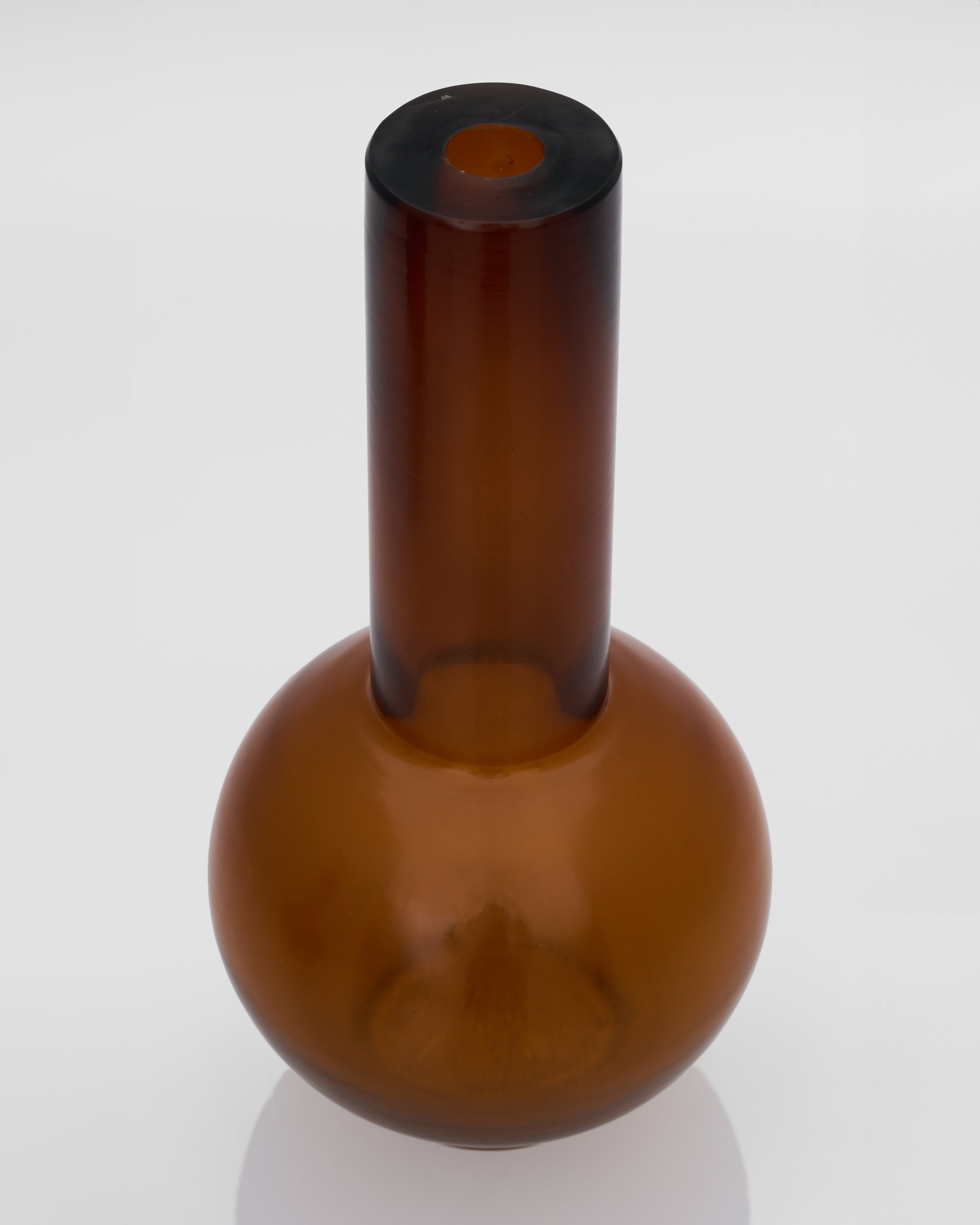 Brown glass bottle on a white background