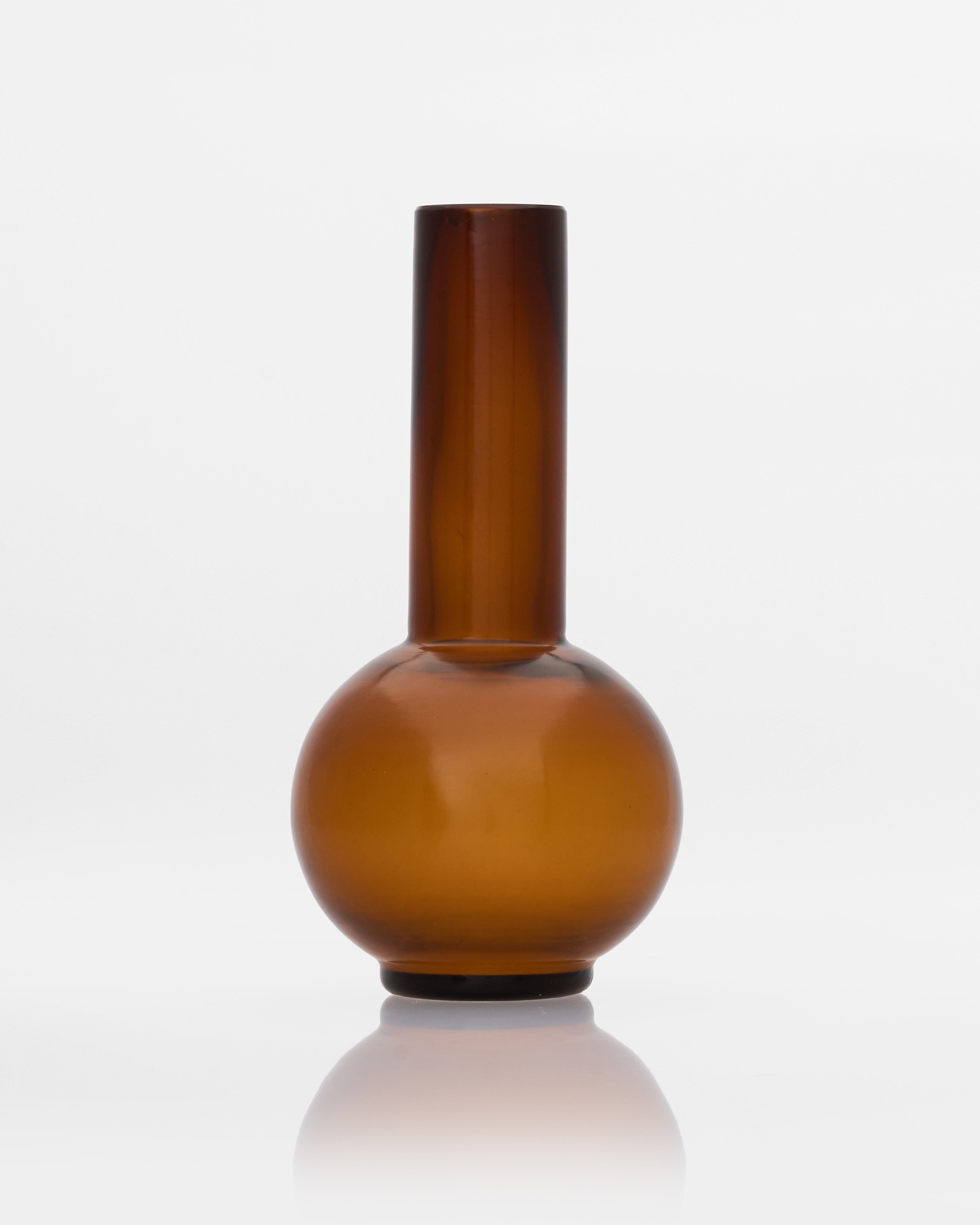 Lumina Brown Bottle Decor styled in a luxury interior as a contemporary decorative accent piece
