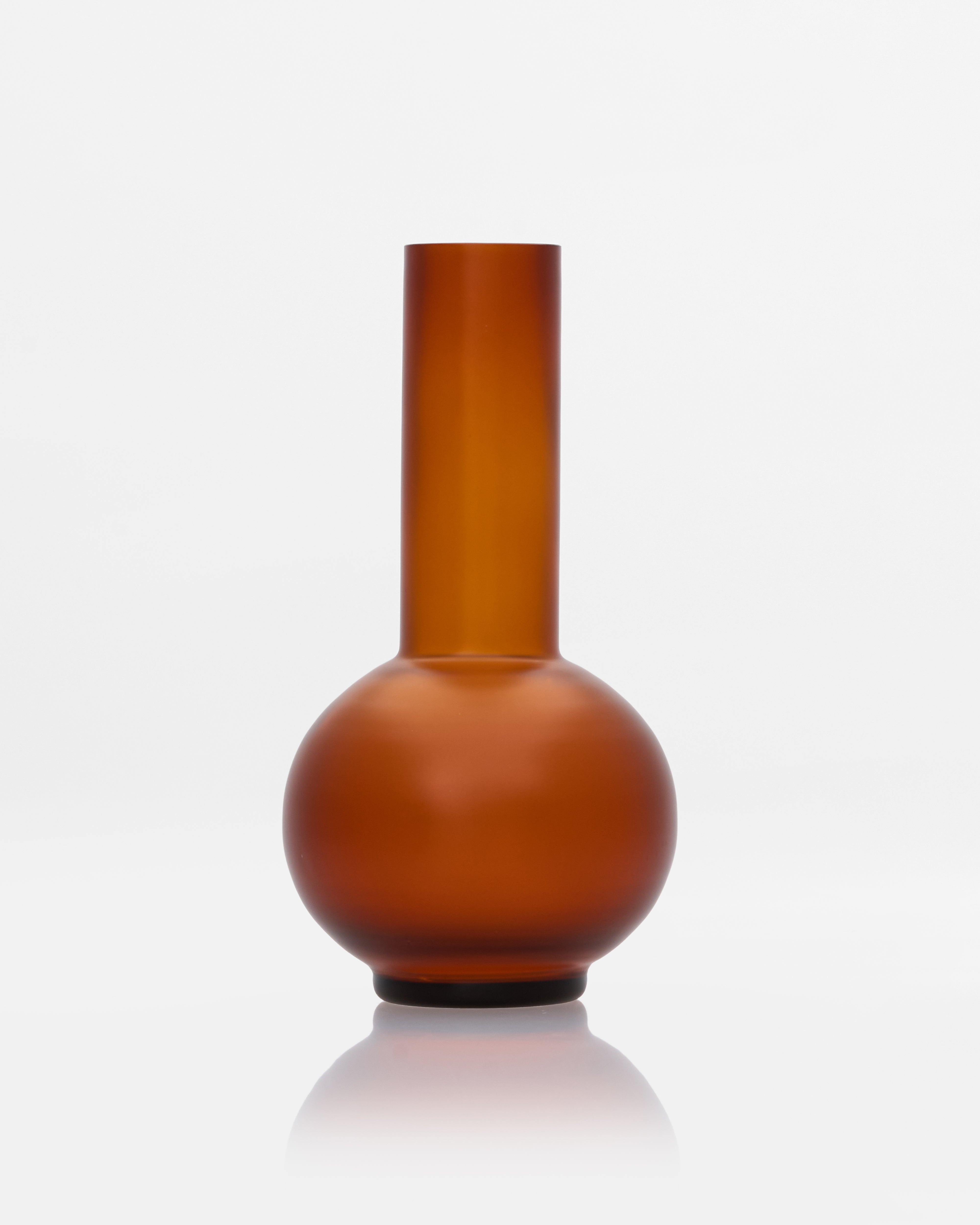 Lumina Brown Bottle Decor styled in a luxury interior as a contemporary decorative accent piece