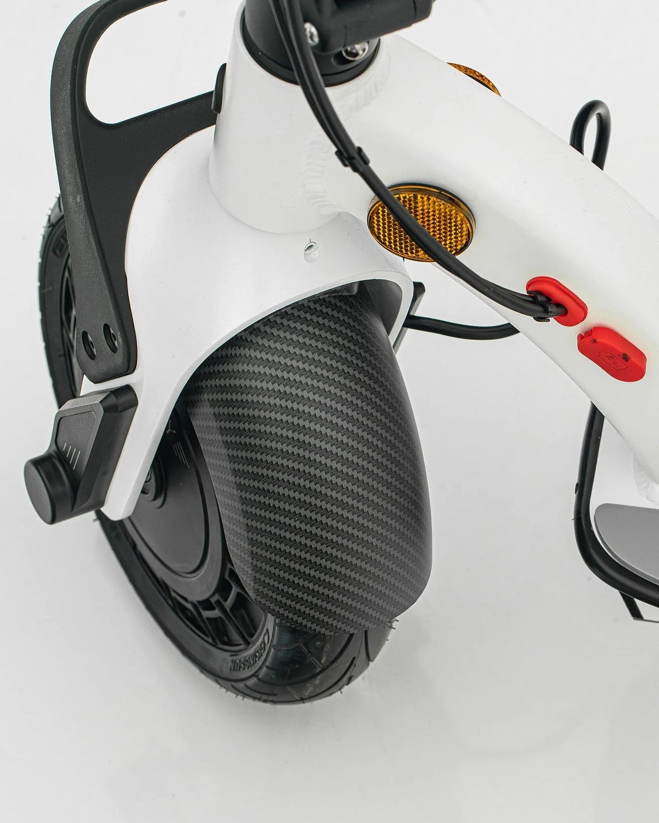 Close-up of a scooter's front wheel and handlebar on a white background